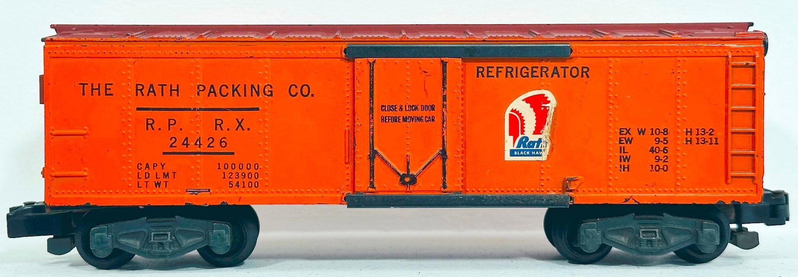American Flyer Postwar S Gauge No. 24426 Rath Packing Refrigerator Car: American Flyer Postwar S Gauge No. 24426 Rath Packing Refrigerator Car, in C7 because of portions of each decal is missing and/or peeling. This is a Scarce Car.