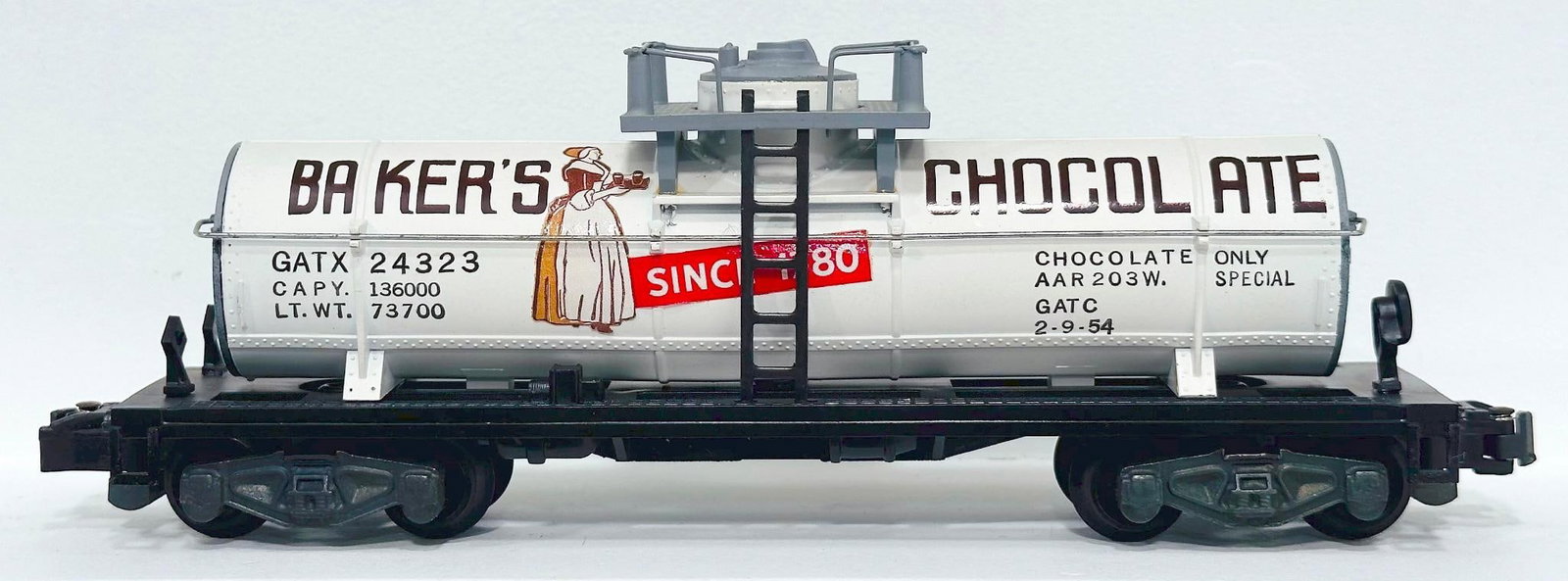 American Flyer Postwar S Gauge No. 24323 Baker Chocolate Tank Car: American Flyer Postwar S Gauge No. 24323 Baker Chocolate Tank Car, in C7 plus or better.