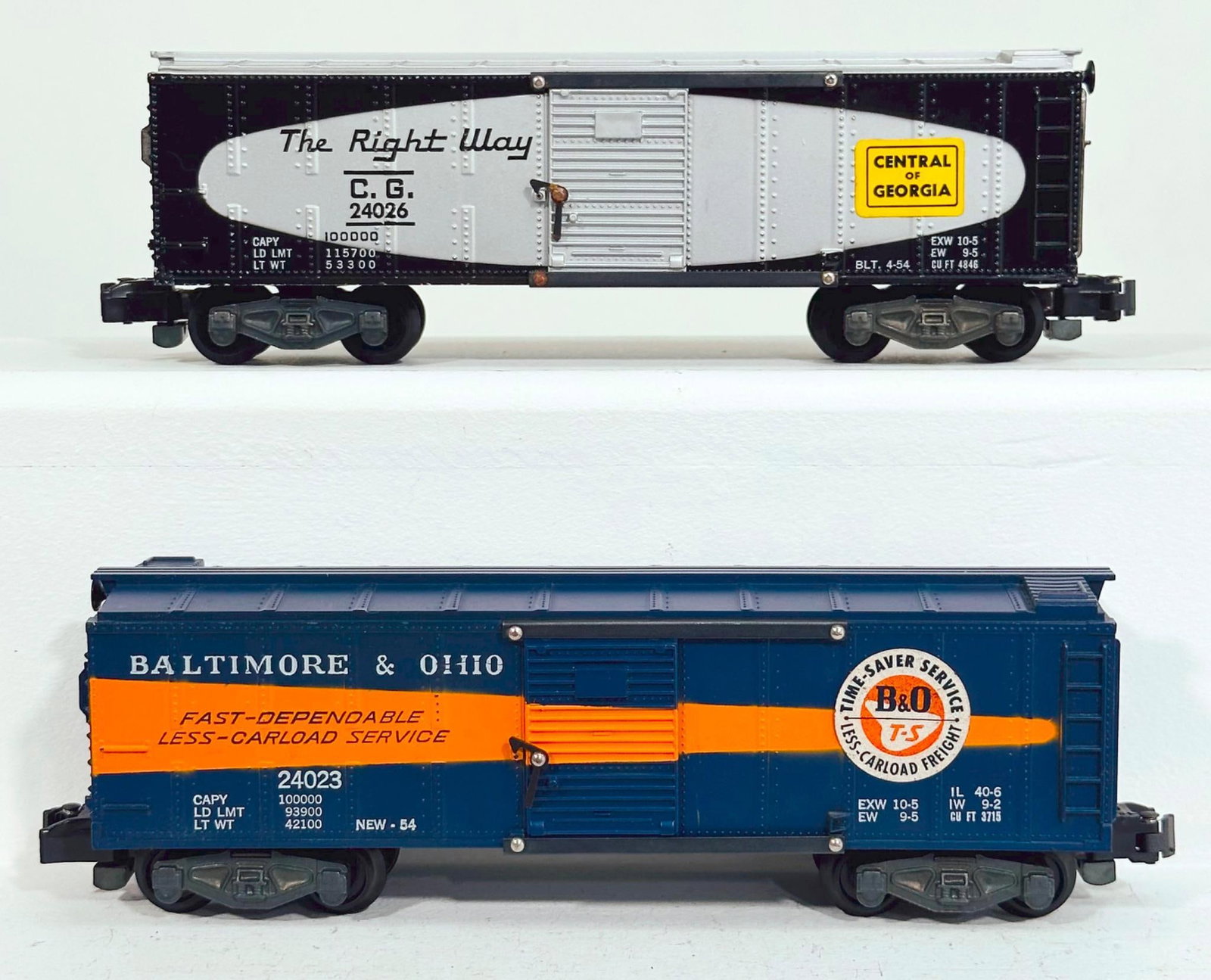 American Flyer Postwar S Gauge No. 24023 B&O Box Car and No. 24026 Central of Georgia Box Car: American Flyer Postwar S Gauge No. 24023 B&O Box Car and No. 24026 Central of Georgia Box Car, each in C7 plus or better.