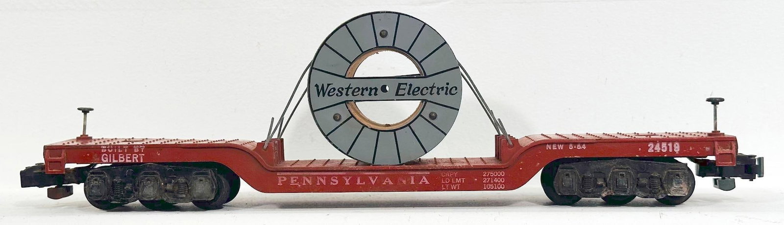 American Flyer Postwar S Gauge 24519 Flat Car with Western Electric Coil: American Flyer Postwar S Gauge 24519 Flat Car with Western Electric Coil, in C7 minus and rare.