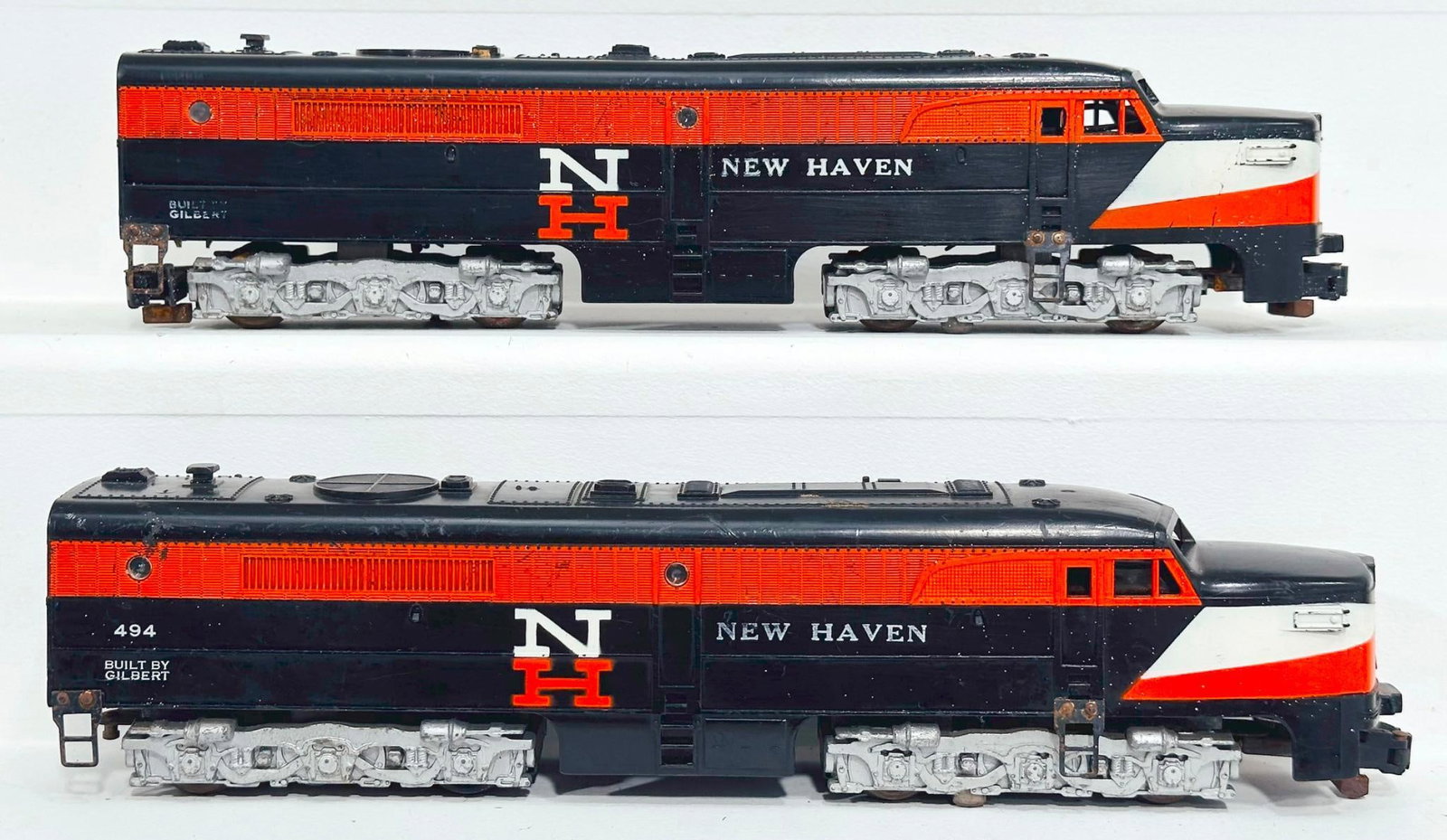 American Flyer Postwar S Gauge New Haven 494 and 495 Alco PAs: American Flyer Postwar S Gauge New Haven 494 and 495 Alco PAs, each in C6 plus because of rust door guides and each missing horns.