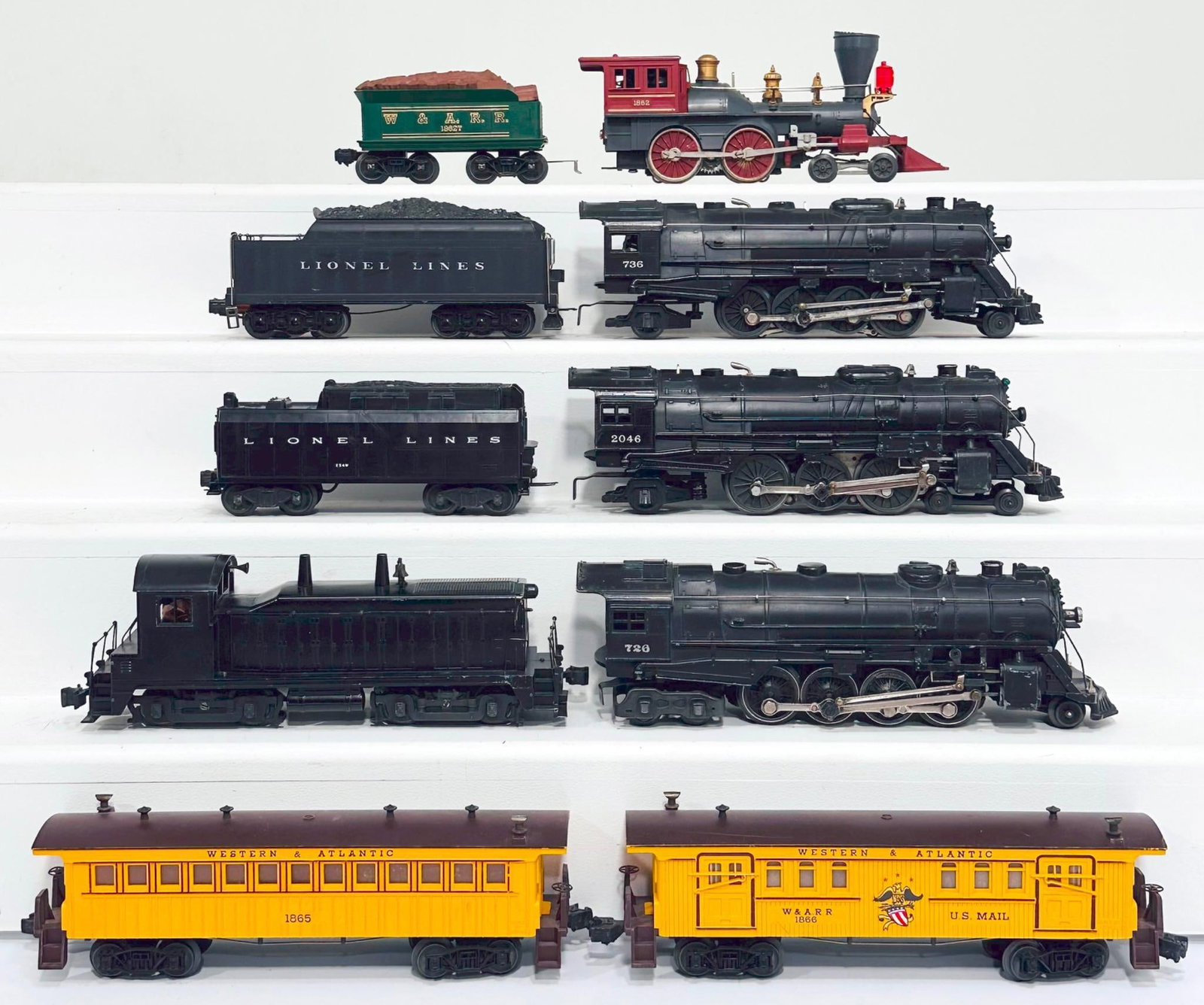 Lionel Postwar O Gauge 1862 Passenger Set and Switcher and Assorted Locomotives and Tenders: Lionel Postwar O Gauge 1862 Passenger Set and Switcher and Assorted Locomotives and Tenders, in C6 to C7, including 736, 2046 and 726 Locomotives and some Tenders. This is a General Condition Lot, mea