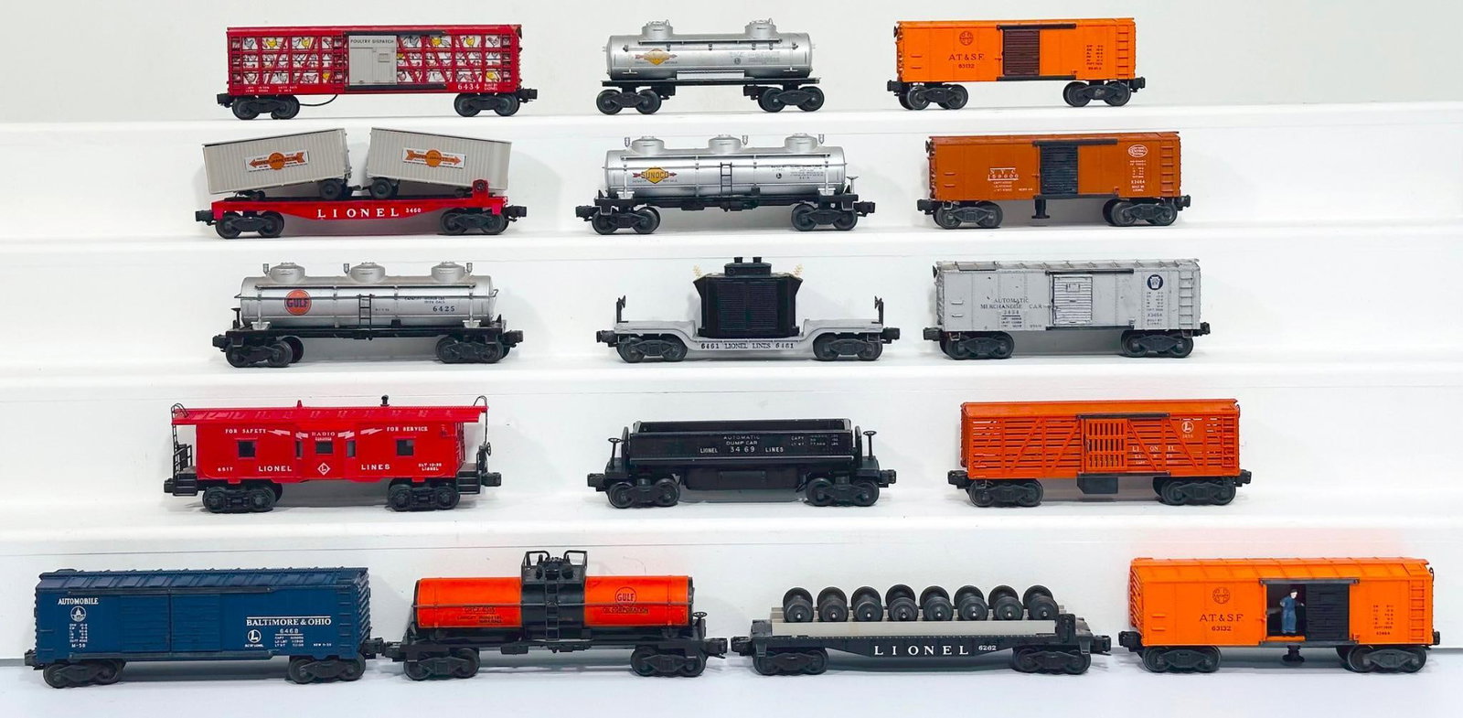 Lionel Postwar O Gauge Sixteen (16) Assorted Freight Cars: Lionel Postwar O Gauge Sixteen (16) Assorted Freight Cars, in C7 or better. This is a General Condition Lot, meaning we have not graded or examined every item in the Lot so the condition will typicall