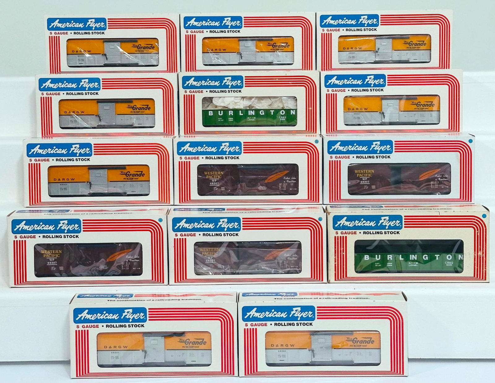 American Flyer Lionel Modern S Gauge Fourteen (14) Assorted Freight Cars Boxed: American Flyer Lionel Modern S Gauge Fourteen (14) Assorted Freight Cars Boxed, including Burlington Northern Gondola X2, Denver and Rio Grande Box Car X8 and Western Pacific Box Car4 X4, each in C9 a