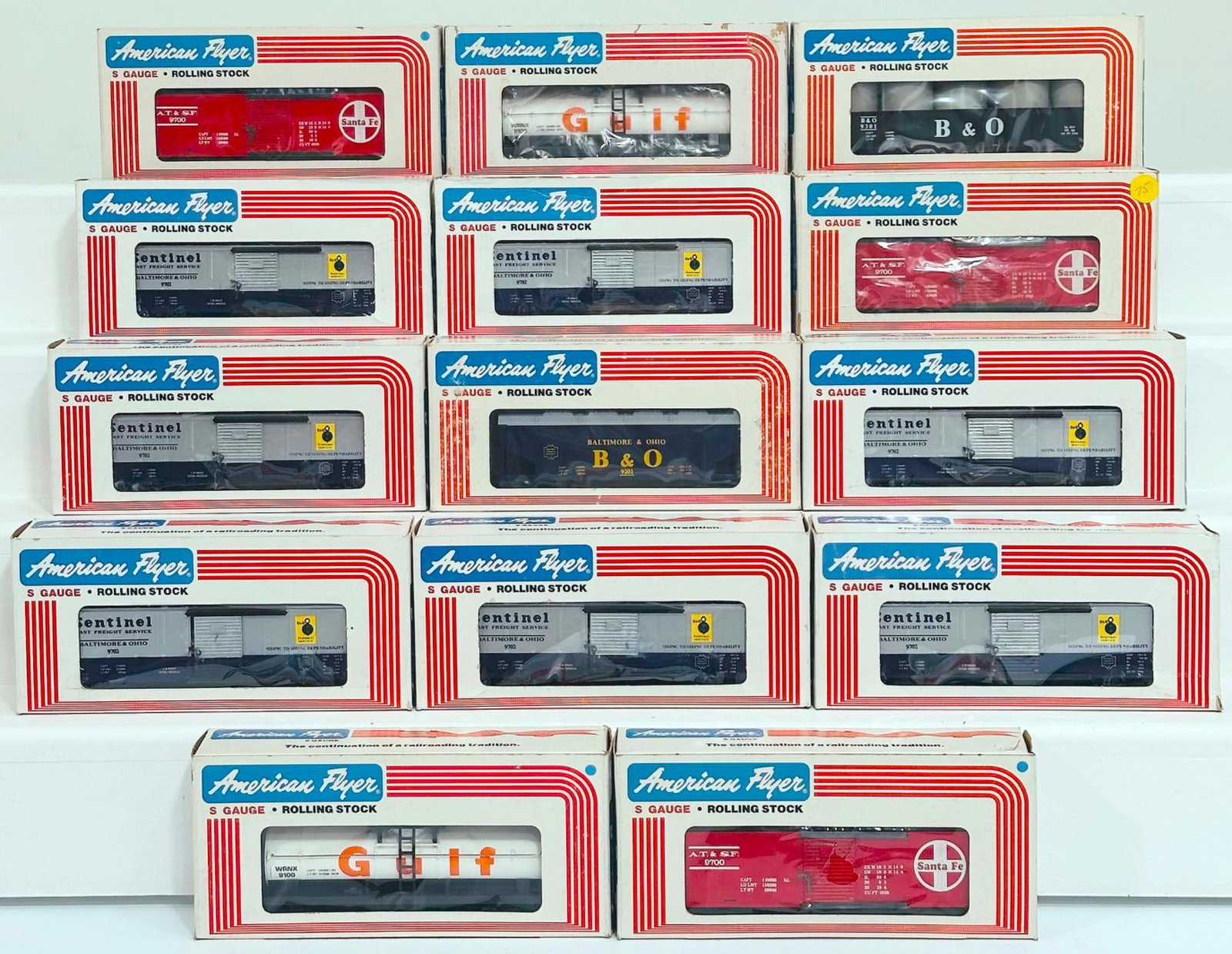 American Flyer Lionel Modern S Gauge Fourteen (14) Assorted Freight Cars Boxed: American Flyer Lionel Modern S Gauge Fourteen (14) Assorted Freight Cars Boxed, including Baltimore and Ohio Gondola, Santa Fe Box Car X3, Baltimore and Ohio Box Car X7, Gulf Tank Car X2 and