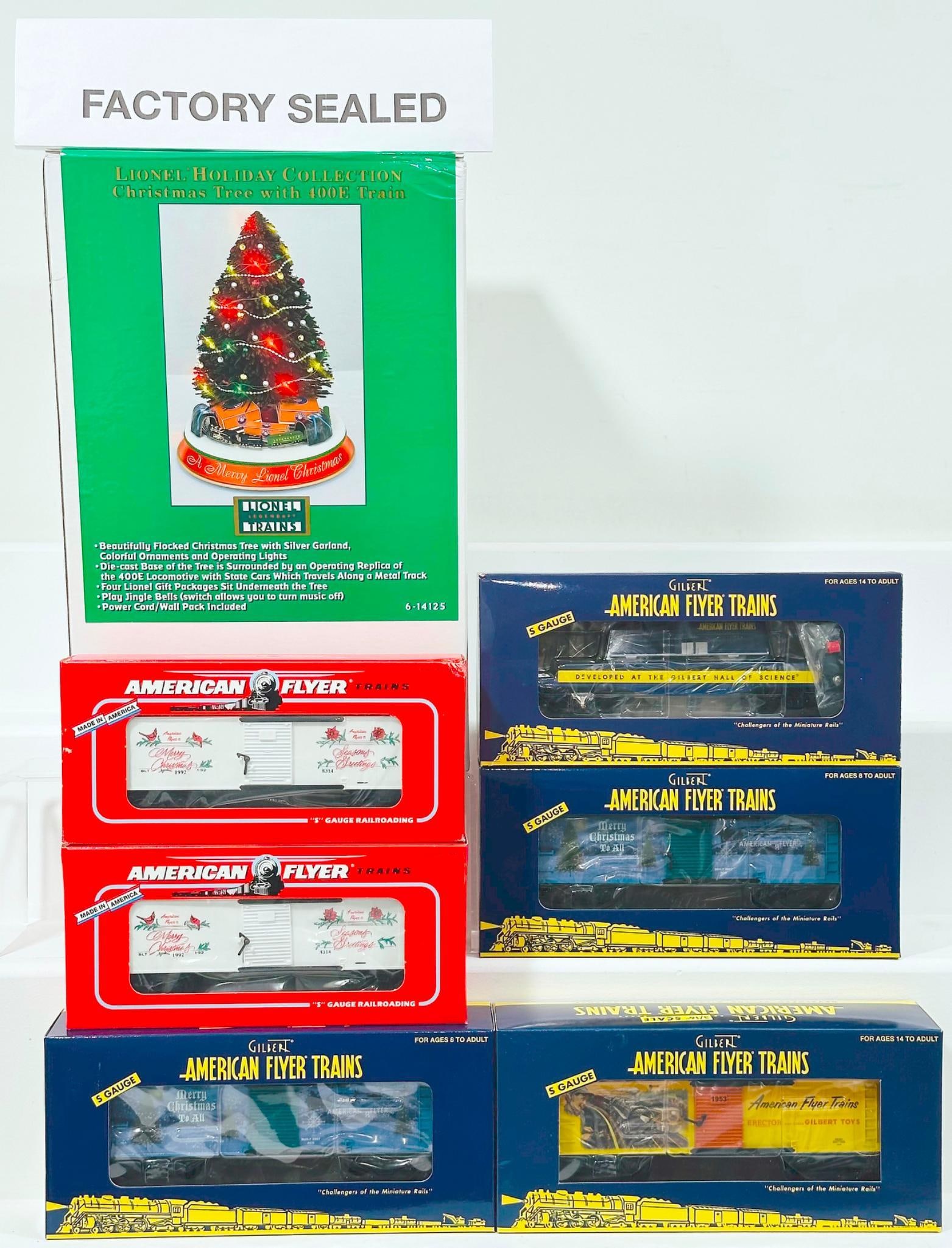 Lionel Modern Holiday Collection Christmas Tree with 400E Train Boxed/AF Lionel Modern S Gauge 6: Lionel Modern Holiday Collection Christmas Tree with 400E Train Boxed and American Flyer Lionel Modern S Gauge Six (6) Assorted Freight Cars Boxed, with the Christmas Tree with 400E Train from the Lio