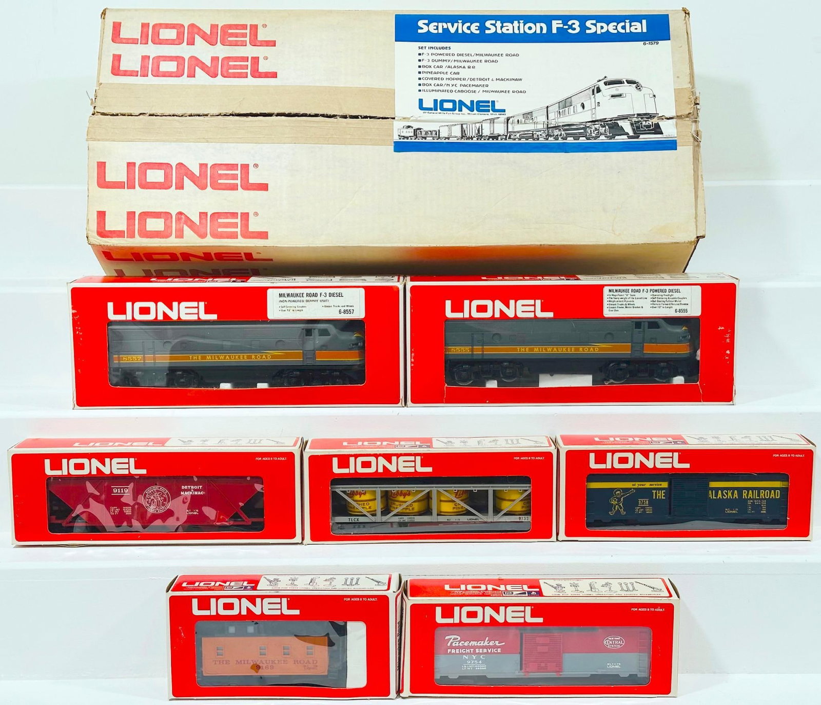 Lionel Modern O Gauge Milwaukee Road F - 3 A - A Diesel Units Service Station F - 3 Special Freight: Lionel Modern O Gauge Milwaukee Road F - 3 A - A Diesel Units Service Station F - 3 Special Freight Set Boxed, each in C9 and each with its original box and also including the original set box.