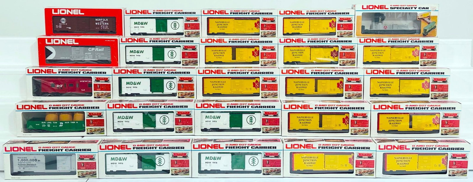 Lionel Modern O Gauge Twenty-Five (25) Assorted Freight Cars Boxed: Lionel Modern O Gauge Twenty-Five (25) Assorted Freight Cars Boxed, including Napierville Junction Box Car X12, Minnesota Dakota & Western Box Car X6, Conrail Searchlight Car, CP Rail Box Car, New