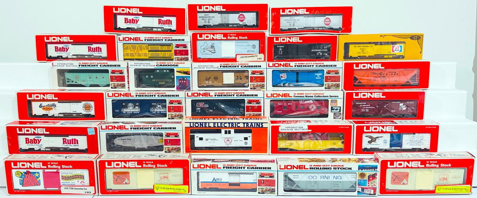 Lionel Modern O Gauge Twenty-four (24) Assorted Freight Cars Boxed: Lionel Modern O Gauge Twenty-four (24) Assorted Freight Cars Boxed, including Gold Metal Billboard Reefer, 1978 TCA Convention Car, LCCA Covered Hopper, TCA Mortgage Brand Ceremony Car X2, Swift Billb