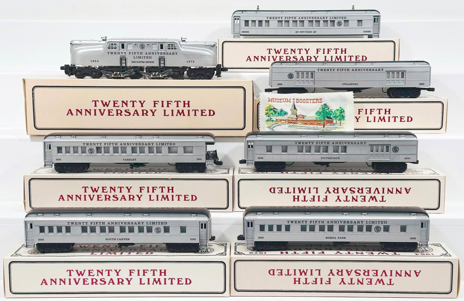 Williams Modern O Gauge TCA 25th Anniversary GG - 1 Electric Locomotive and Six (6) Assorted TCA: Williams Modern O Gauge TCA 25th Anniversary GG - 1 Electric Locomotive and Six (6) Assorted TCA Passenger Cars Boxed, each in C8 or better.