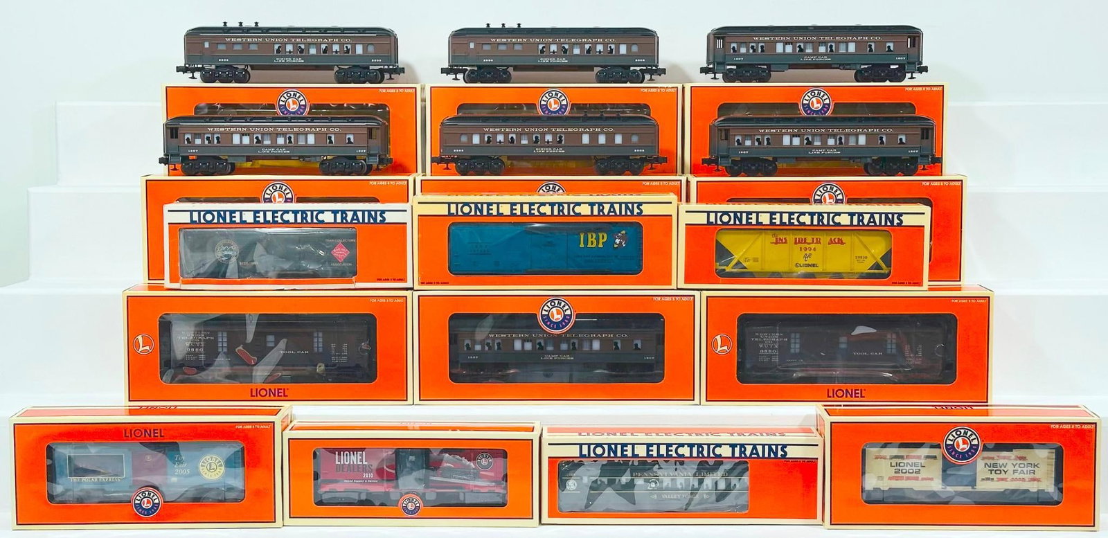 Lionel Modern O Gauge Sixteen (16) Assorted Freight and Passenger Cars Boxed: Lionel Modern O Gauge Sixteen (16) Assorted Freight and Passenger Cars Boxed, including 2005 Toy Fair Box Car, Toy Fair Box Car 2002, LRRC Western Union Dining Car, LRRC Western Union Baby Madison Pas
