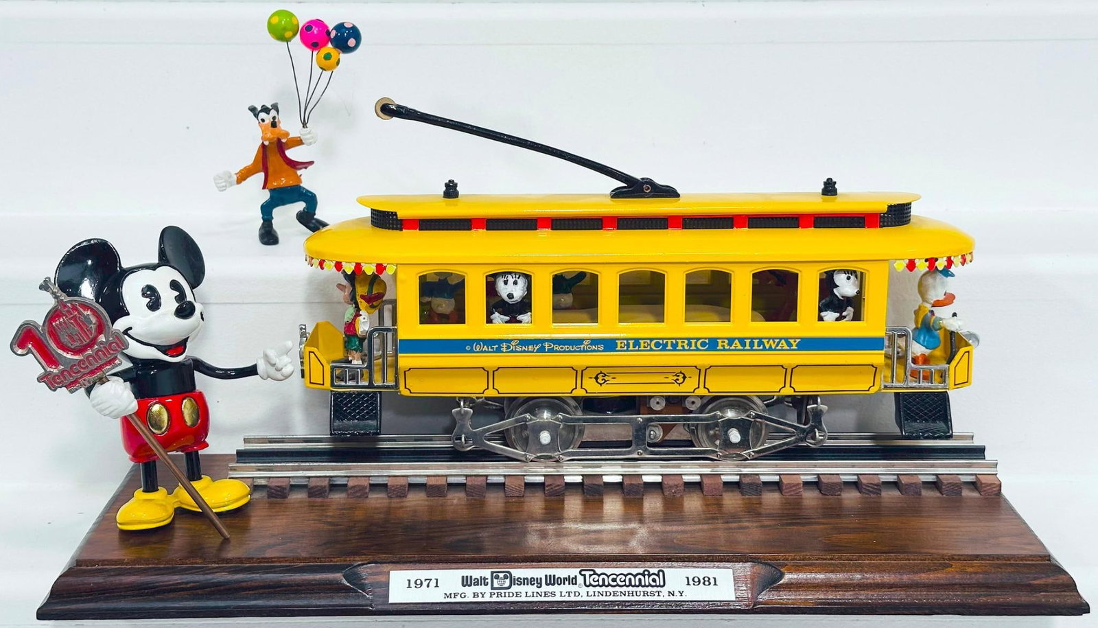 Pride Lines Modern O Gauge Walt Disney Productions Electric Railway Trolley with wood/track base (1 of 9)