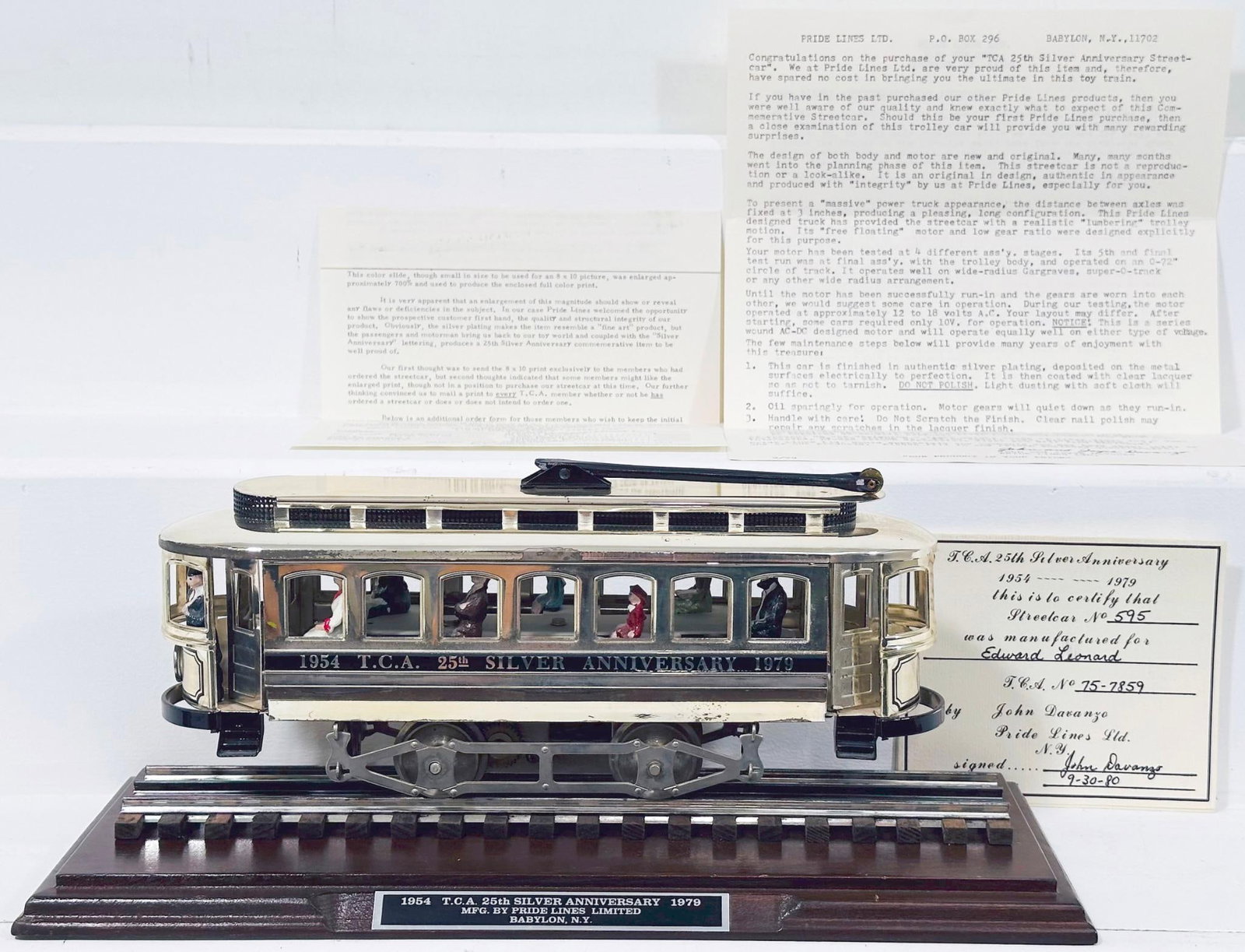 Pride Lines Modern O Gauge 1979 TCA 25th Silver Anniversary Disney Trolley with wood base with track: Pride Lines Modern O Gauge 1979 TCA 25th Silver Anniversary Disney Trolley with wood base with track, in C8 or better.