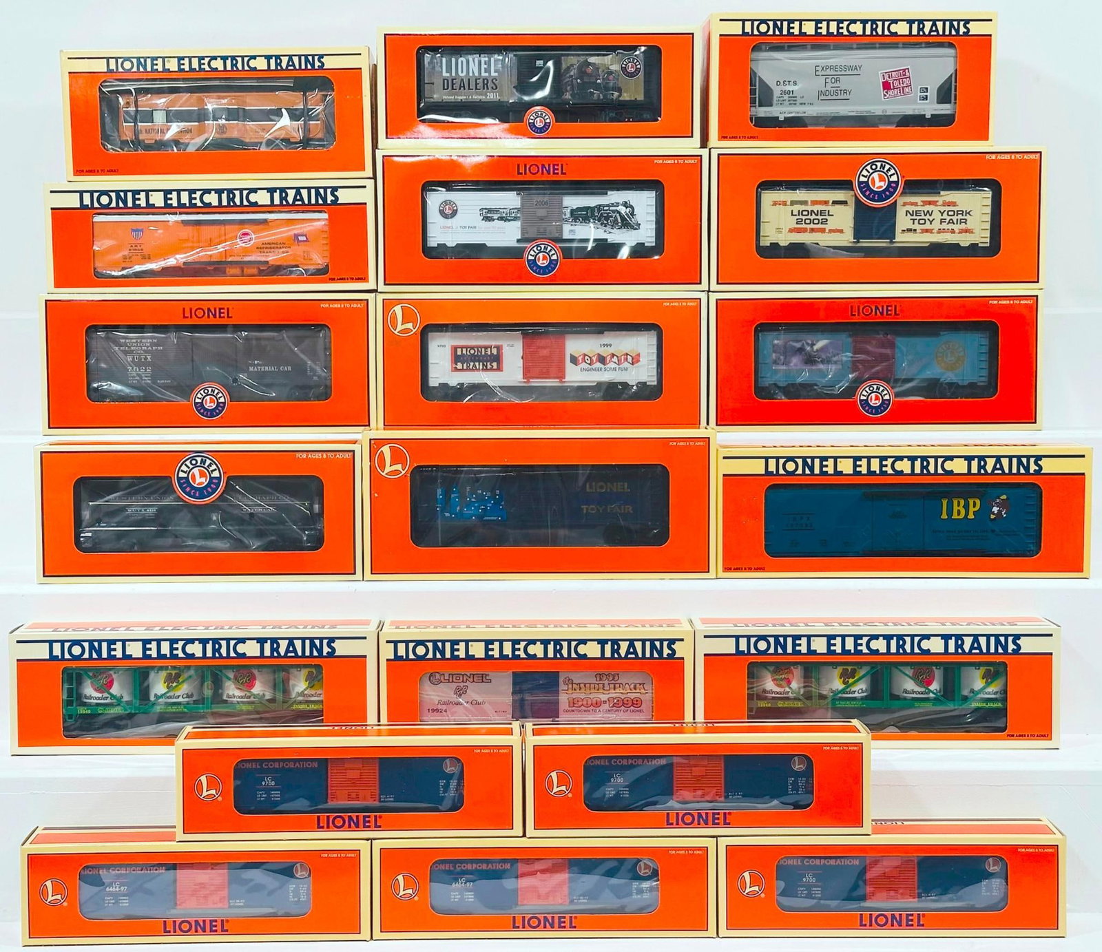 Lionel Modern O Gauge Twenty (20) Assorted Freight Cars Boxed: Lionel Modern O Gauge Twenty (20) Assorted Freight Cars Boxed, including 1995 LCCA Convention Car Refer, LRRC Western Union Woodsided Reefer, BC Toy fair 00, 2005 Toy Fair Box Car, Toy Fair Box Car 20