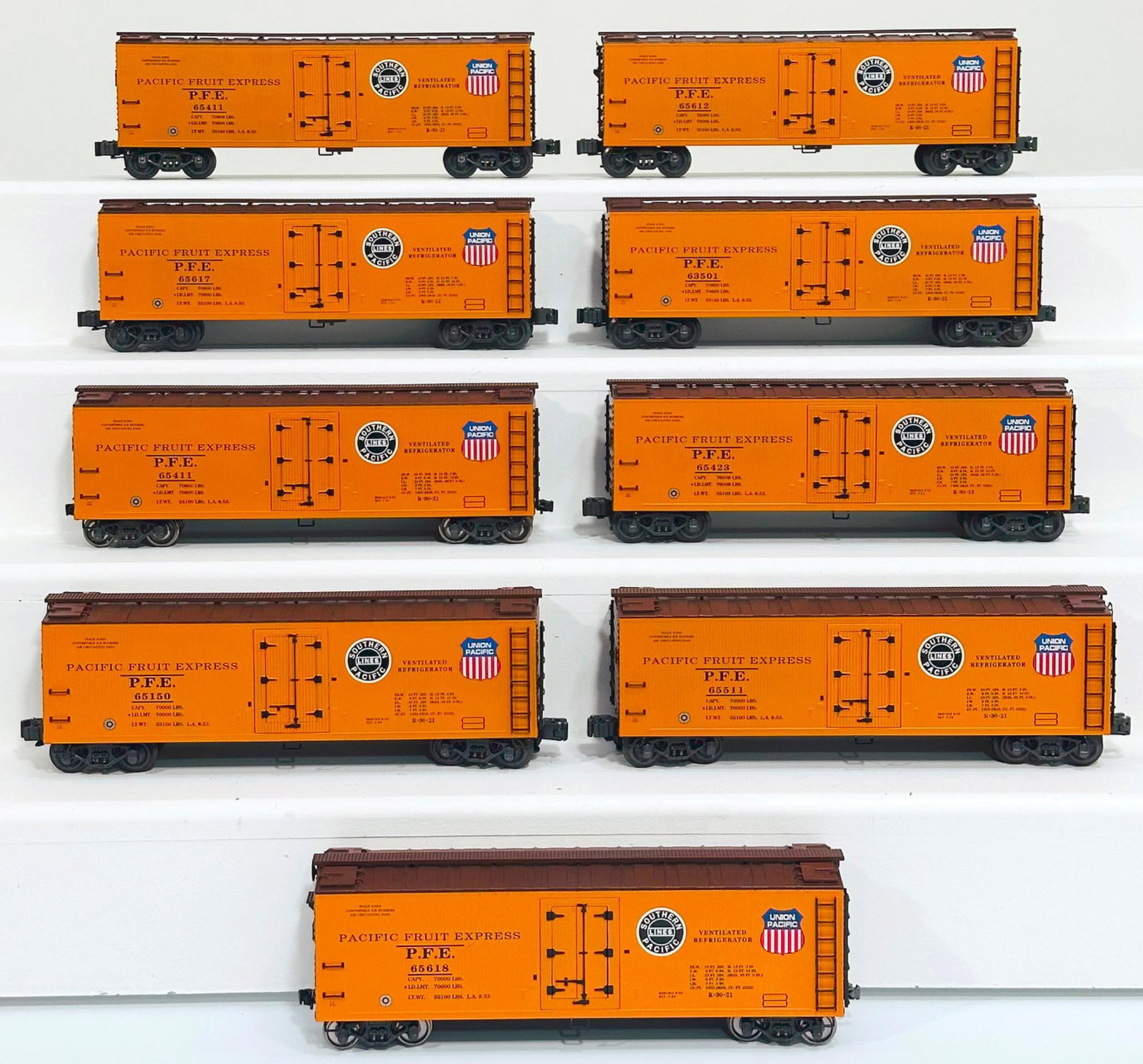 K-Line Modern O Gauge Pacific Fruit Express Car and Southern Pacific Lines Woodsided Refrigerator: K-Line Modern O Gauge Pacific Fruit Express Car and Southern Pacific Lines Woodsided Refrigerator Car X9, each in C7 plus or better.