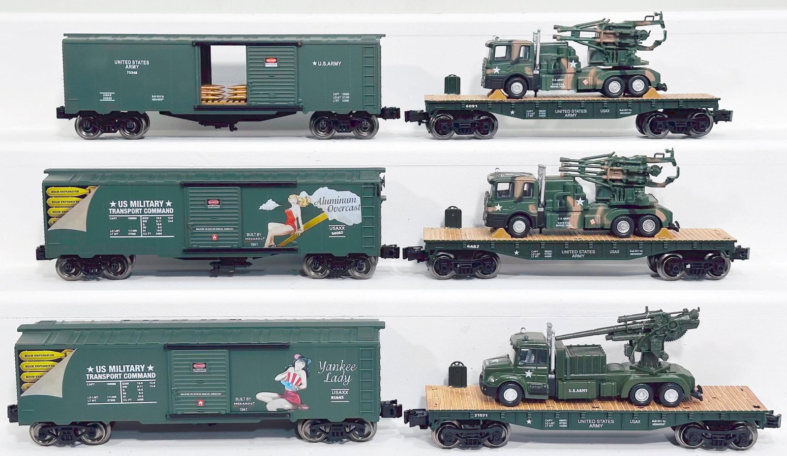 Menards Modern O Gauge Military Transport Command Box Car X3 and Flat Car with Military Weapons: Menards Modern O Gauge Military Transport Command Box Car X3 and Flat Car with Military Weapons Truckload X3, each in C7 plus or better.