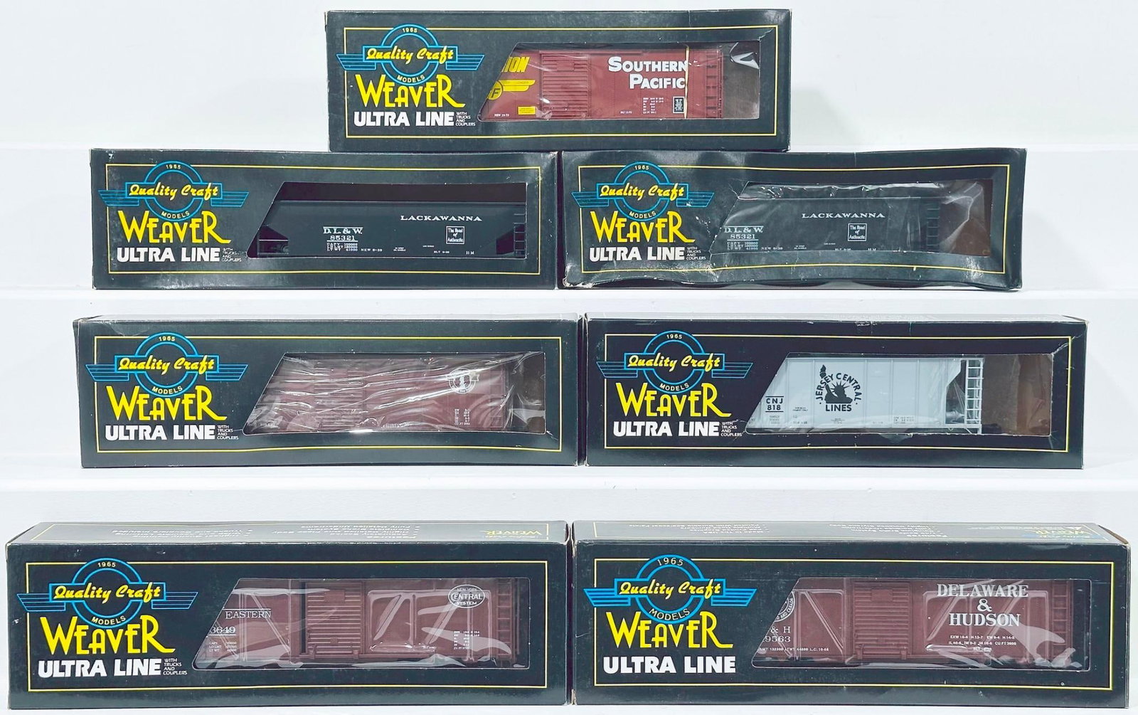 Weaver Models Modern O Gauge Seven (7) Assorted Freight Cars Boxed: Weaver Models Modern O Gauge Seven (7) Assorted Freight Cars Boxed, including Peoria Eastern Steel Side Box Car, Denver Delaware & Hudson Steel Sided Box Car, Southern Pacific Steel Sided Box Car, DL 