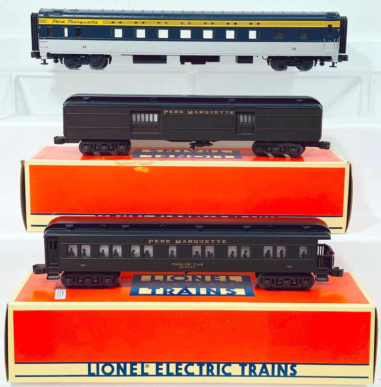 Lionel Modern O Gauge Pere Marquette Madison - Type Heavyweight Observation Car and Pere Marquette: Lionel Modern O Gauge Pere Marquette Madison - Type Heavyweight Observation Car and Pere Marquette Madison - Type Baggage Car Boxed, each in C9 and each with its original box. This Lot also includes M