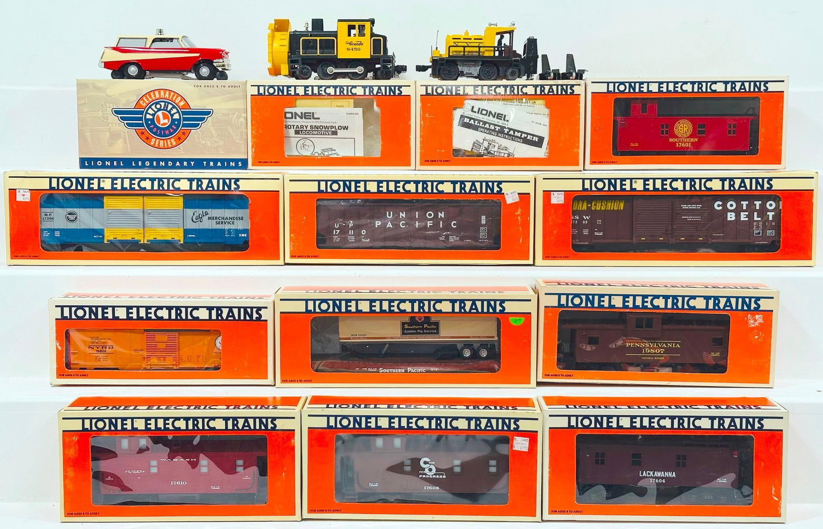 Lionel Modern O Gauge Assorted Small Motorized Units and Ten (10) Assorted Freight Cars Boxed: Lionel Modern O Gauge Assorted Small Motorized Units and Ten (10) Assorted Freight Cars Boxed, including Executive Inspection Car, Rio Grande Rotary Snowplow and New York Central Track Ballast Tamper,