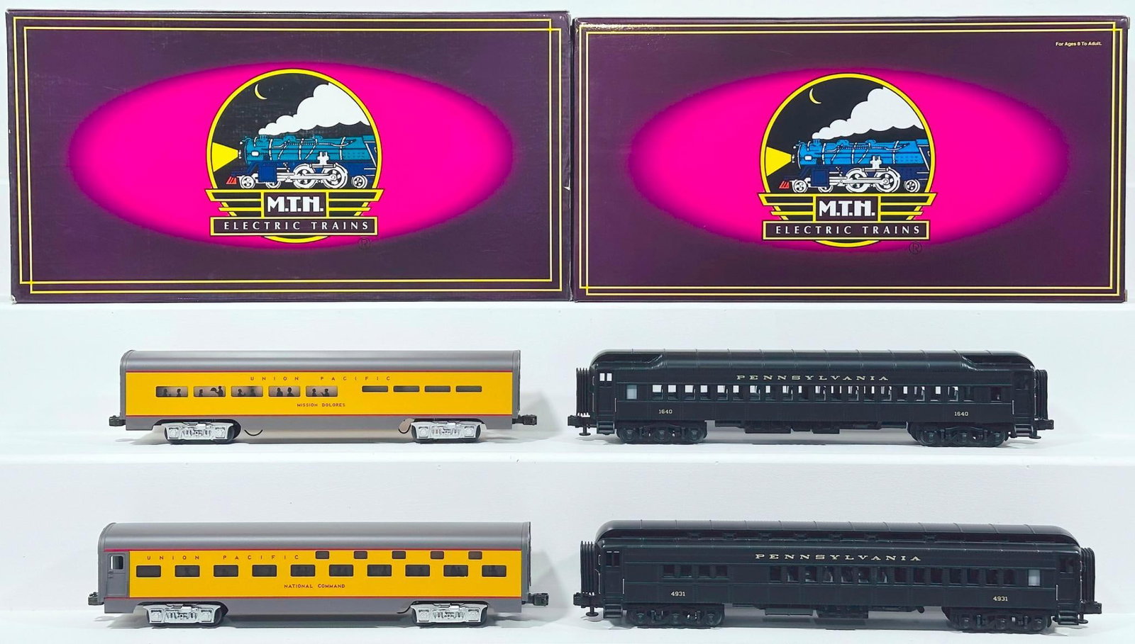 MTH Modern O Gauge Pennsylvania 70 foot 2 Car Madison Combination/Diner Passenger Set Boxed/UP: MTH Modern O Gauge Pennsylvania 70 foot 2 Car Madison Combination/Diner Passenger Set Boxed and Union Pacific Painted 60 foot Aluminum Sleeper/Diner Set Boxed, each in C9 and each with its original