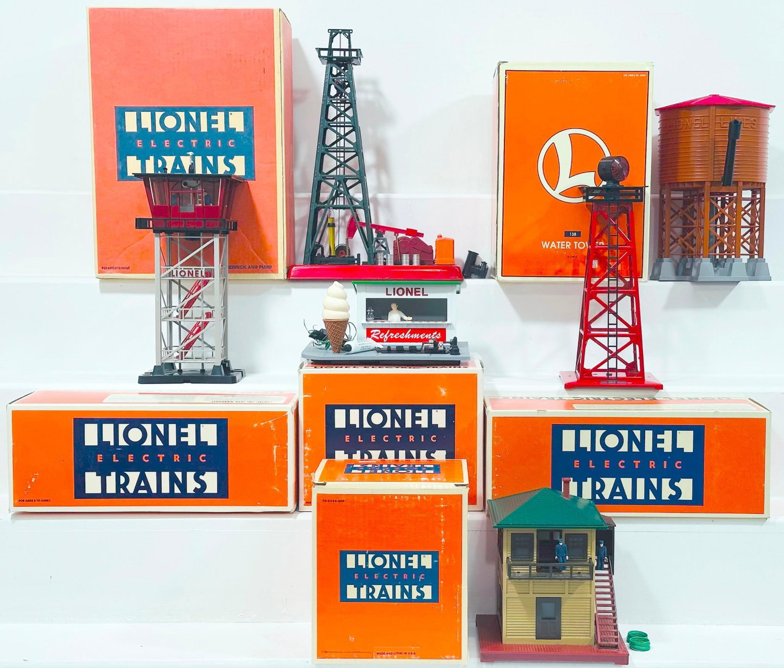 Lionel Modern O Gauge Six (6) Assorted Accessories Boxed: Lionel Modern O Gauge Six (6) Assorted Accessories Boxed, including Operating Switch Tower, Animated Refreshment Stand, Oil Derrick and Pump, Water Tower, Rotary Beacon and Illuminated Operating Contr