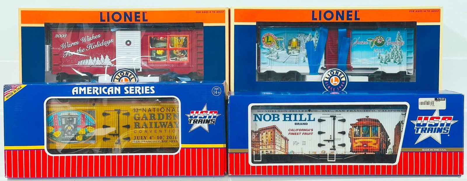 Lionel Modern G Scale USA Trains Modern G Scale Holiday Box Cars (2008 and 2011) and Reefer Cars X2: Lionel Modern G Scale USA Trains Modern G Scale Holiday Box Cars (2008 and 2011) and Reefer Cars X2 Boxed, each in C8 and each with its original box.