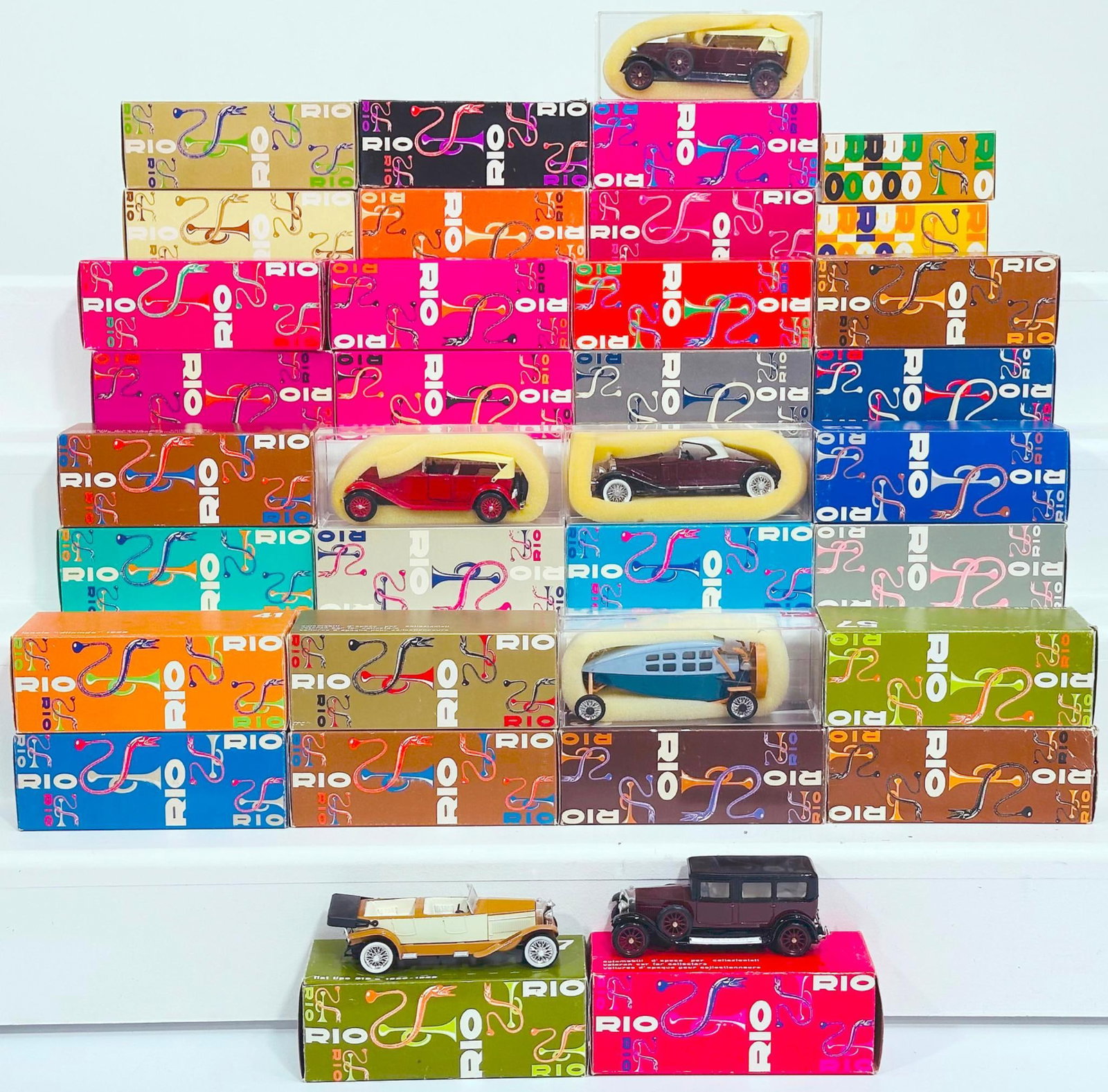 Rio Modern Thirty-one (31) Assorted Diecast Cars and Trucks Boxed: Rio Modern Thirty-one (31) Assorted Diecast Cars and Trucks Boxed, each in C9 and each with its original box.