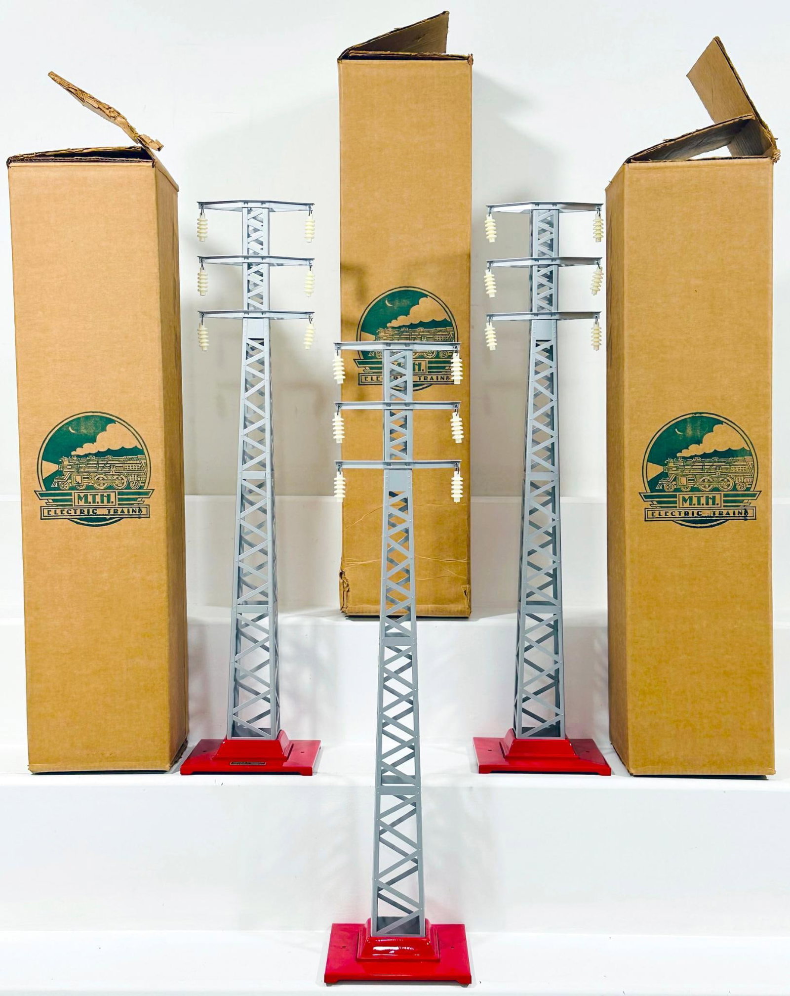 MTH Modern Standard Gauge 94 High Tension Tower X3: MTH Modern Standard Gauge 94 High Tension Tower X3, each in C9 and each with its original box.