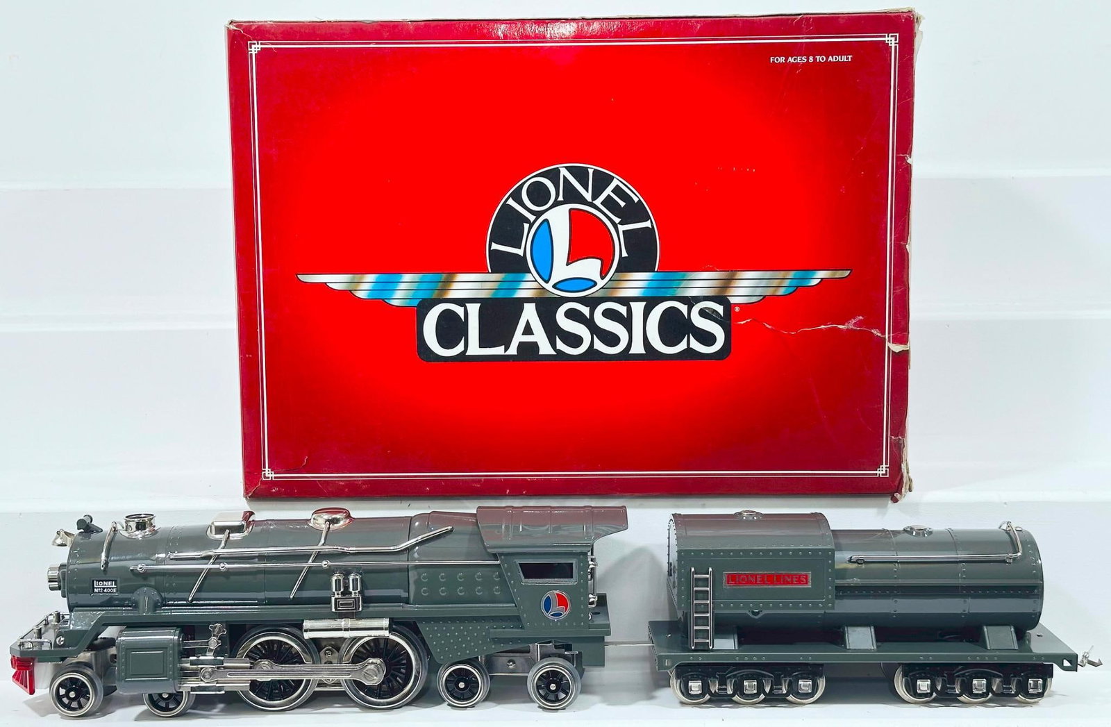 Lionel Modern Classics 400E Gray Locomotive and Tender Boxed: Lionel Modern Classics 400E Gray Locomotive and Tender Boxed, in C9 and with its original box.