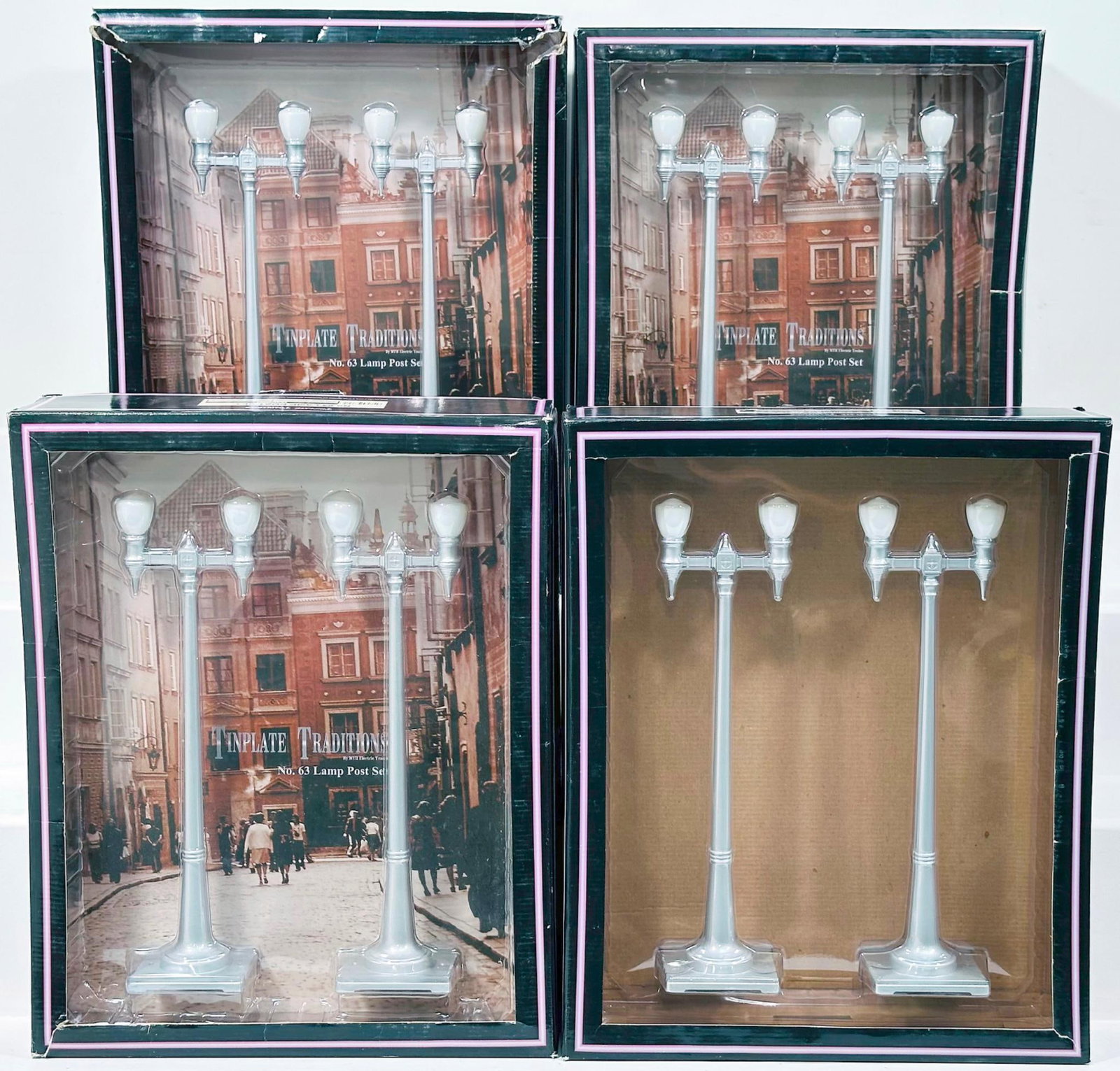 MTH Modern Tinplate Traditions Standard Gauge No. 63 Lamppost Set Boxed X4: MTH Modern Tinplate Traditions Standard Gauge No. 63 Lamppost Set Boxed X4, each in C9 and each with its original box.