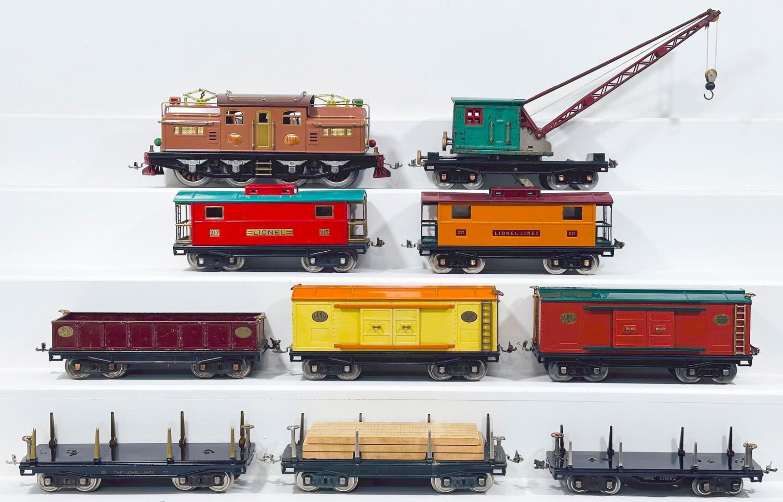 Lionel Prewar Standard Gauge 408E Two-Tone Brown Repainted Electric Locomotive and Nine (9) Assorted: Lionel Prewar Standard Gauge 408E Two-Tone Brown Repainted Electric Locomotive and Nine (9) Assorted Freight Cars Repainted, including 408E Two-Tone Brown Electric Locomotive, 219 Crane, 214 Automobil