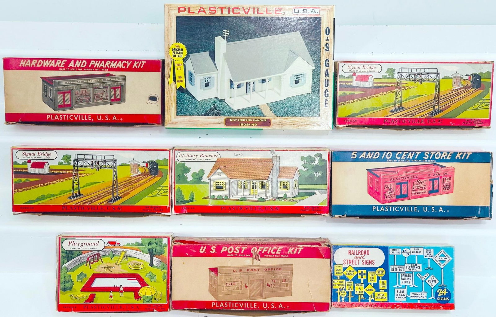 Bachmann/Plasticville Postwar and Modern O Gauge Nine (9) Assorted Kits Boxed: Bachmann/Plasticville Postwar and Modern O Gauge Nine (9) Assorted Kits Boxed, each in C8 and each with its original box.
