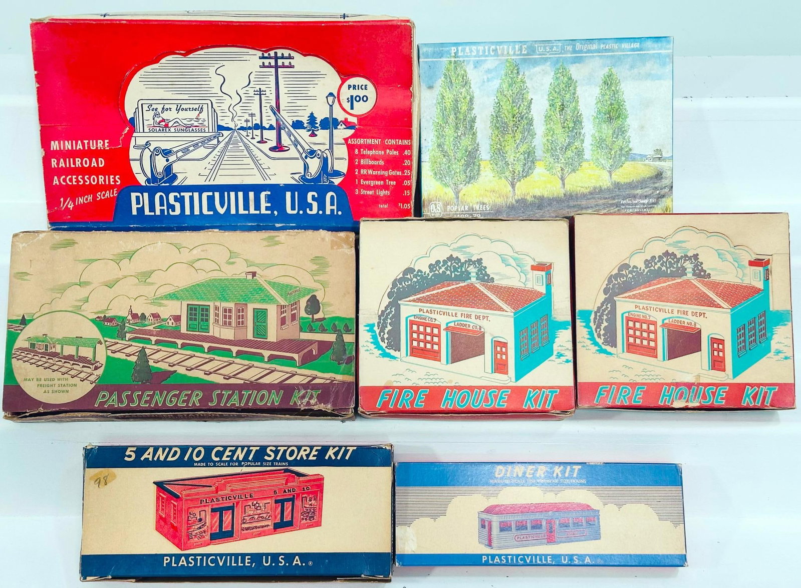 Bachmann/Plasticville Postwar and Modern O Gauge Seven (7) Assorted Kits Boxed: Bachmann/Plasticville Postwar and Modern O Gauge Seven (7) Assorted Kits Boxed, each in C8 and each with its original box.