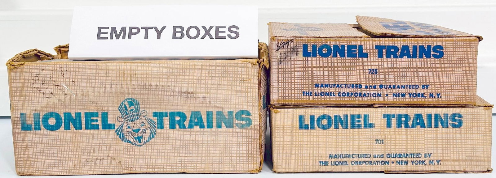 Lionel Postwar O Gauge Outfit No. 1549 - 701- 725 original Set Boxes only: Lionel Postwar O Gauge Outfit No. 1549 - 701- 725 original Set Boxes only, with the 1549 showing heavy wear and torn top flaps, the 701 showing heavy wear, and the 725 showing light to moderate wear. 