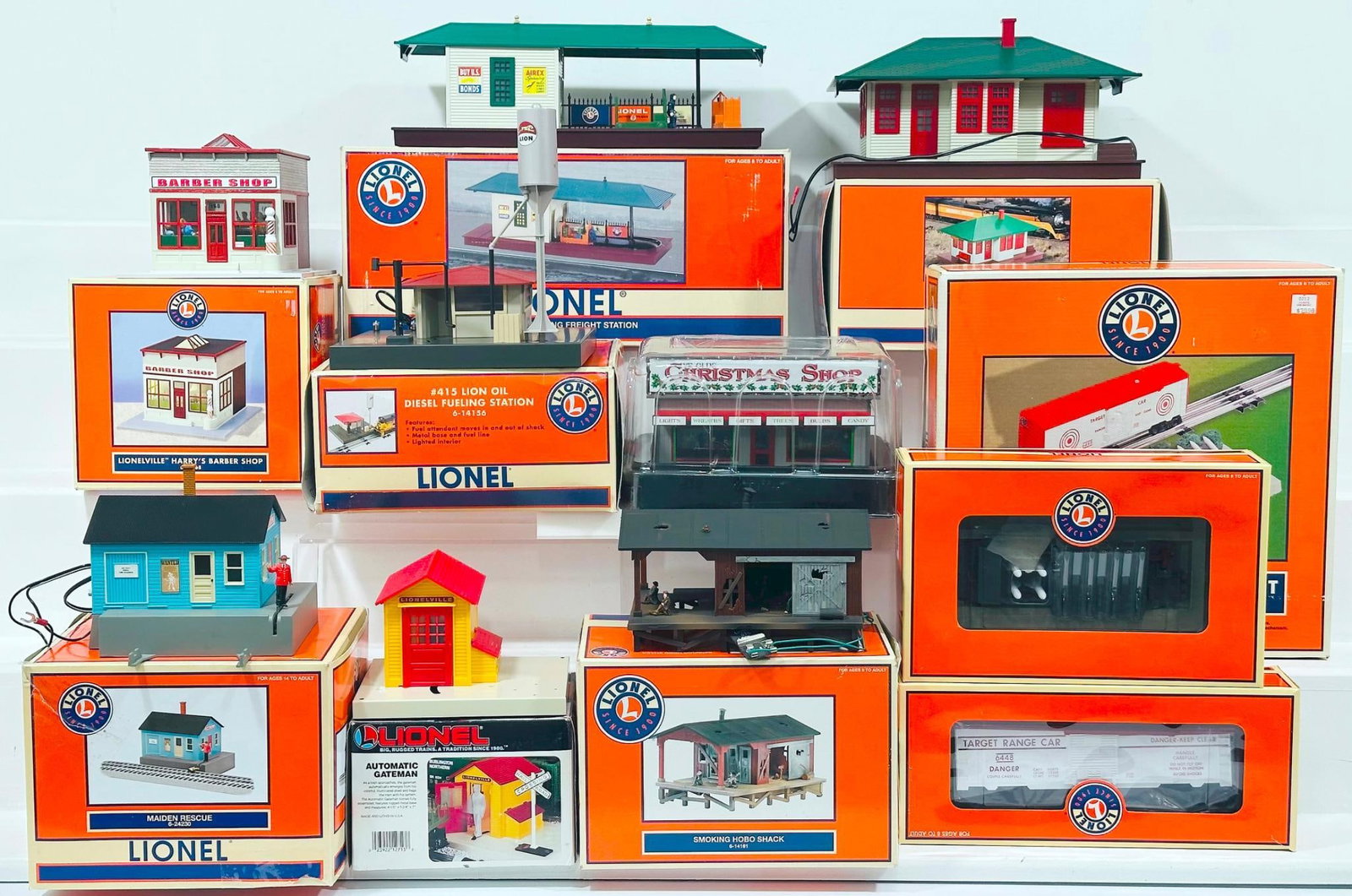 Lionel Modern O Gauge Nine (9) Assorted Accessories Boxed: Lionel Modern O Gauge Nine (9) Assorted Accessories Boxed, including Maiden Rescue, Lighted Passenger Station, Automatic Gateman, No. 356 Operating Freight Station, No. 415 Lion Oil Diesel Fueling Sta