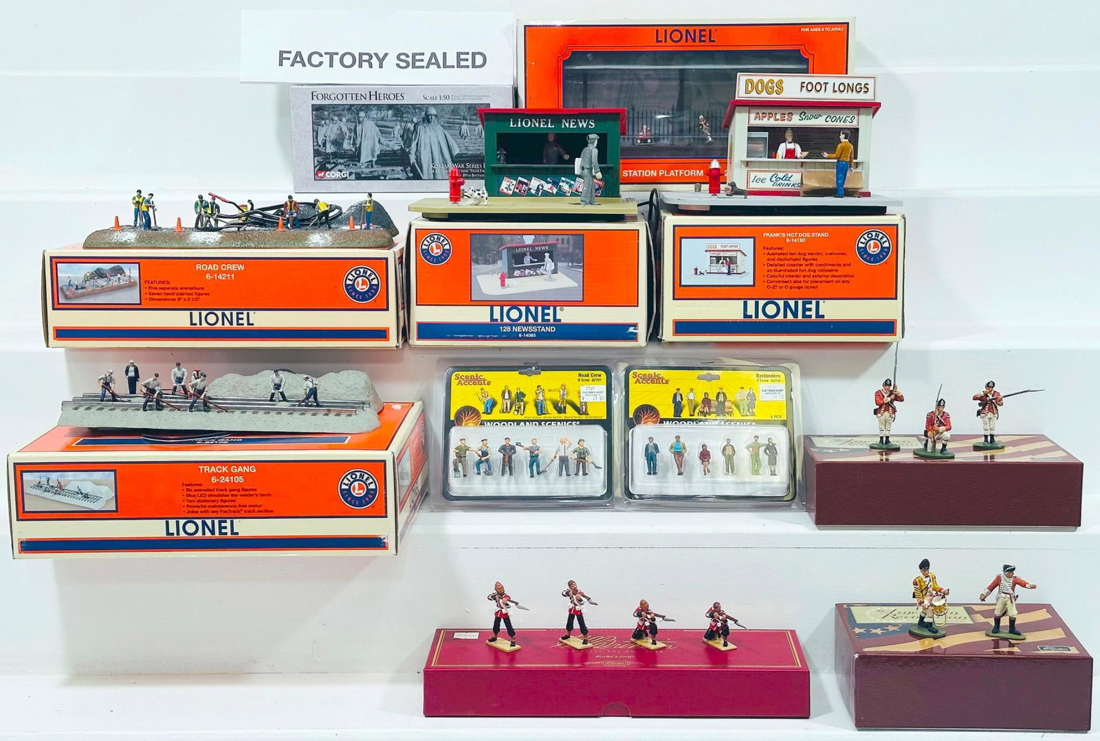 Lionel Modern O Gauge Five (5) Assorted Accessories Boxed: Lionel Modern O Gauge Five (5) Assorted Accessories Boxed, including Station Platform, Road Crew, Track Gang, Frank’s Hot Dog Stand and 128 Newsstand, each in C7 plus or better and each with its ori