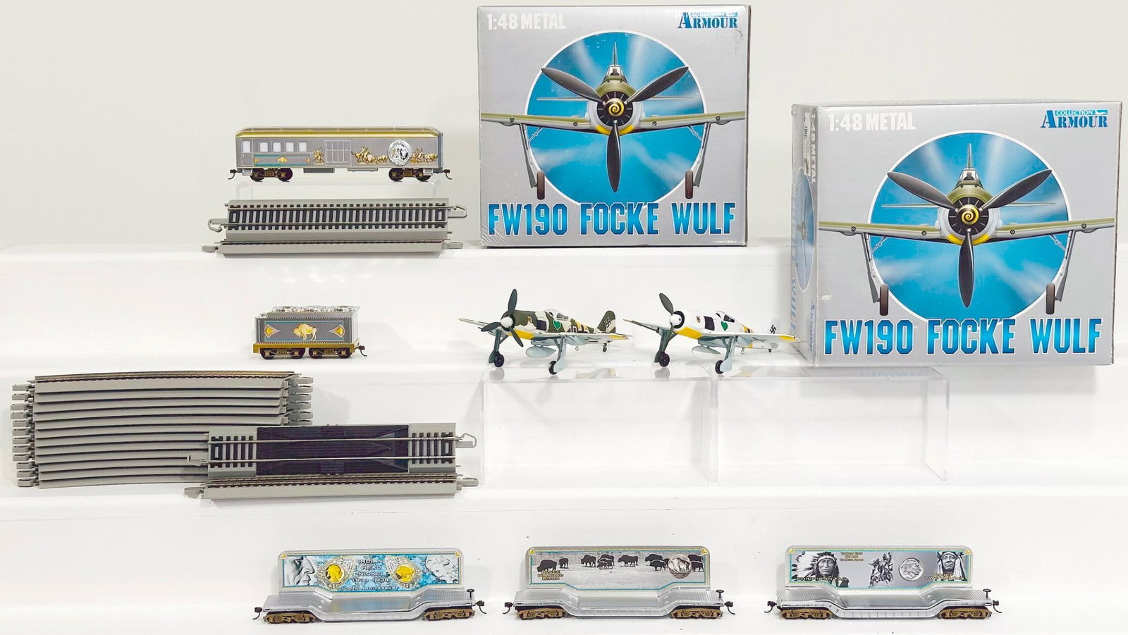 Armour Modern 1:48 Metal FW190 Focke Walf Boxed X2: Armour Modern 1:48 Metal FW190 Focke Walf Boxed X2, each in C8 and each with its original box. Also in this Lot are four (4) train cars and a tender, each in C7.