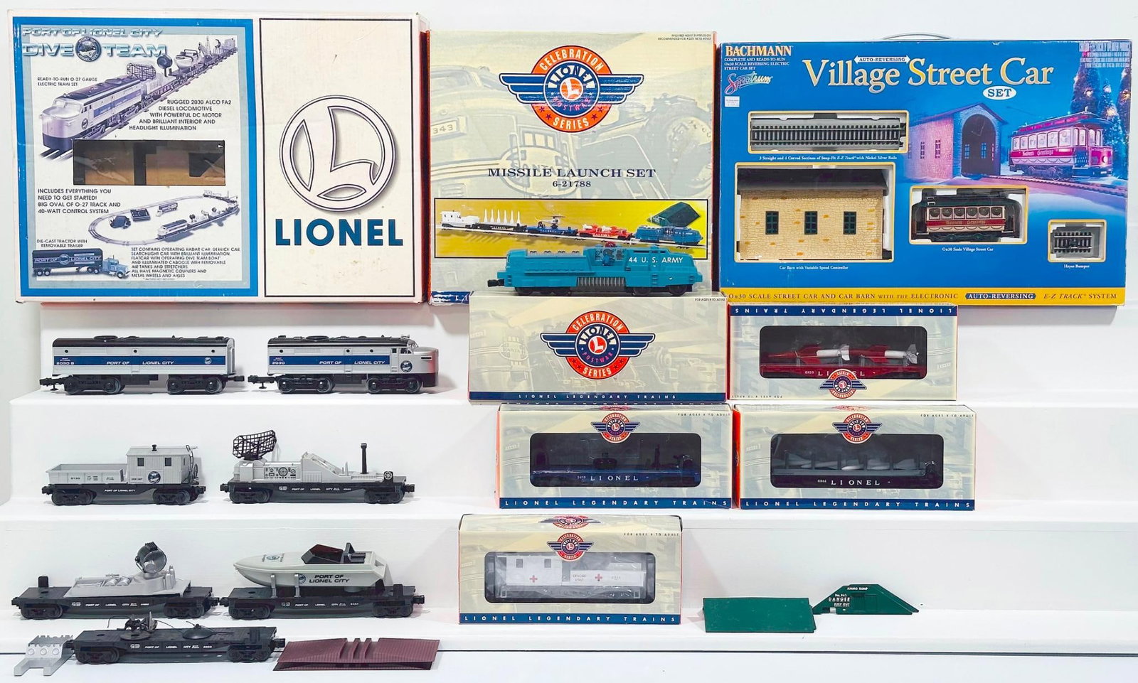 Lionel Modern O Gauge Port of Lionel City Dive Team Electric Locomotive Freight Set and Missile: Lionel Modern O Gauge Port of Lionel City Dive Team Electric Locomotive Freight Set and Missile Launch Set Boxed, each in C7 plus or better and each with its original box. This Lot also includes Bachm