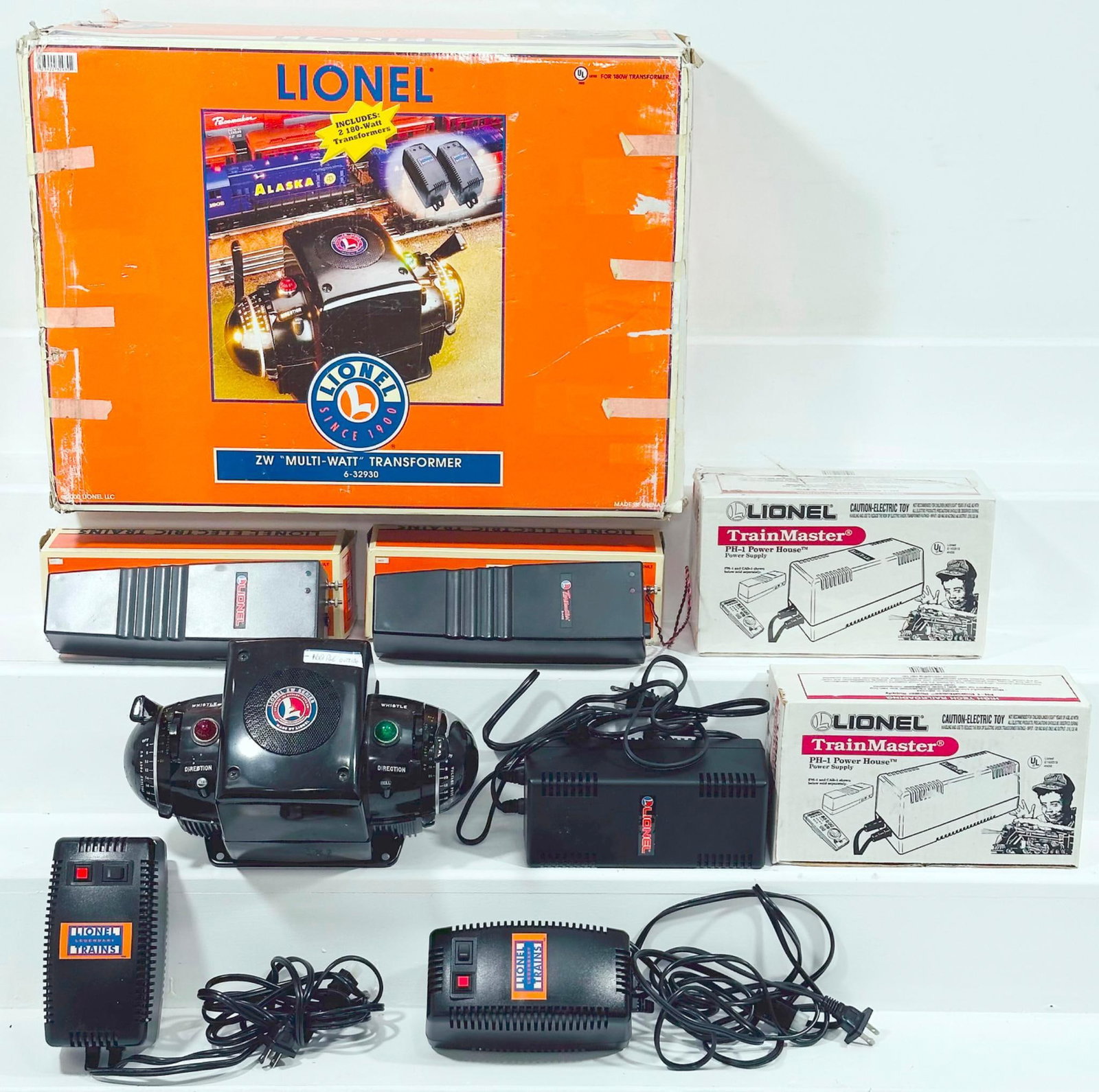 Lionel Modern O Gauge 2W Multi - Watt Transformer/ Trainmaster Power Master X2/ Trainmaster Power pH: Lionel Modern O Gauge 2W Multi - Watt Transformer/ Trainmaster Power Master X2/ Trainmaster Power pH - 1 Powerhouse Supply X2, each in C7 or better and each with its original box, with each original b