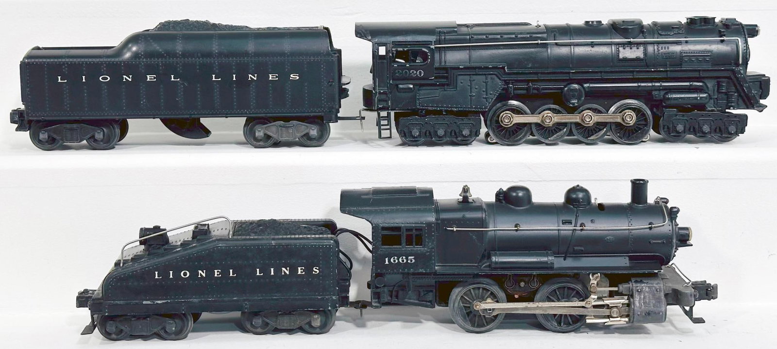 Lionel Postwar O Gauge 1665 Switcher and 2020 Locomotive and Tender: Lionel Postwar O Gauge 1665 Switcher and 2020 Locomotive and Tender, with each in C7 minus or better.