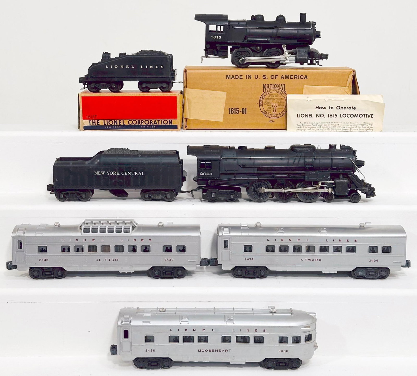 Lionel Postwar O Gauge 1615 and 1615T Switcher Locomotive and Tender and 2056 Locomotive Passenger: Lionel Postwar O Gauge 1615 and 1615T Switcher Locomotive and Tender and 2056 Locomotive Passenger Set, with the 1615 Switcher Locomotive and Tender, each in C7 or better and each with its original