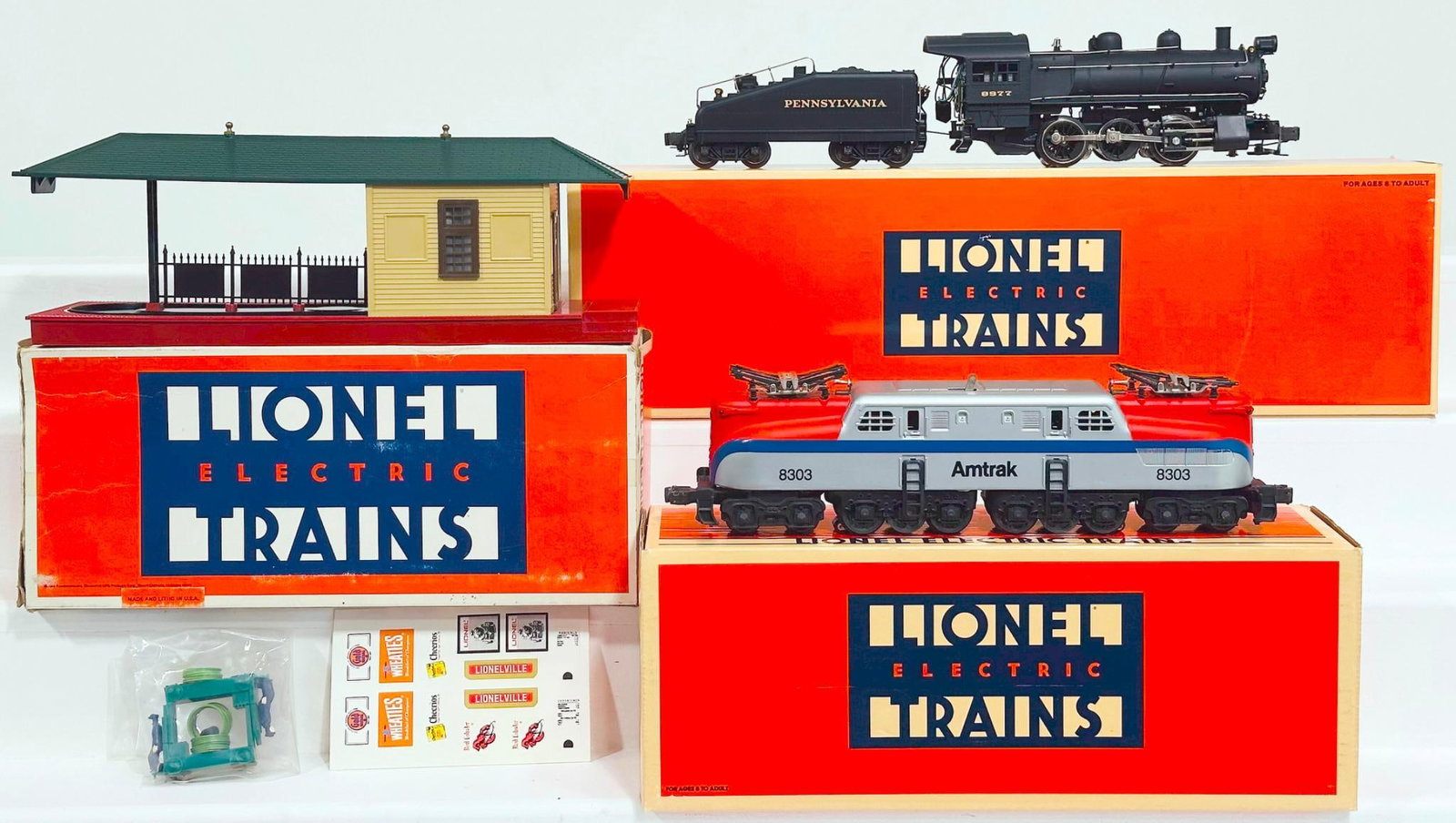 Lionel Modern O Gauge Amtrak GG - 1 Electric Locomotive and Pennsylvania 0 - 6 - 0 B6 Switcher: Lionel Modern O Gauge Amtrak GG - 1 Electric Locomotive and Pennsylvania 0 - 6 - 0 B6 Switcher Locomotive and Tender Boxed, each in C9 and each with its original box. This Lot also includes Operating 