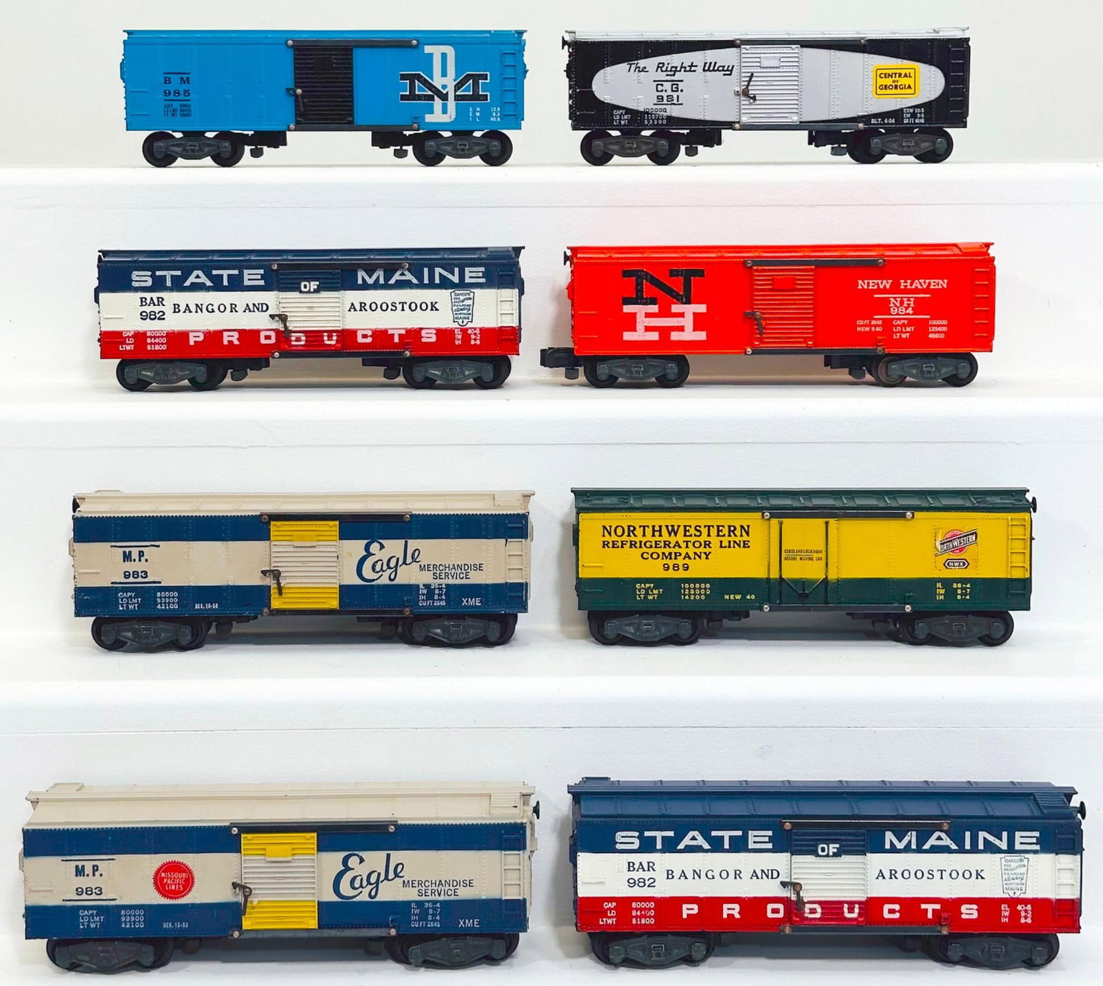 American Flyer Postwar S Gauge Eight (8) Assorted Box Cars: American Flyer Postwar S Gauge Eight (8) Assorted Box Cars, including 985 Boston and Maine in C7 plus, 981 Central of Georgia in C7 plus, 982 State of Maine in C7 minus because of rust on door