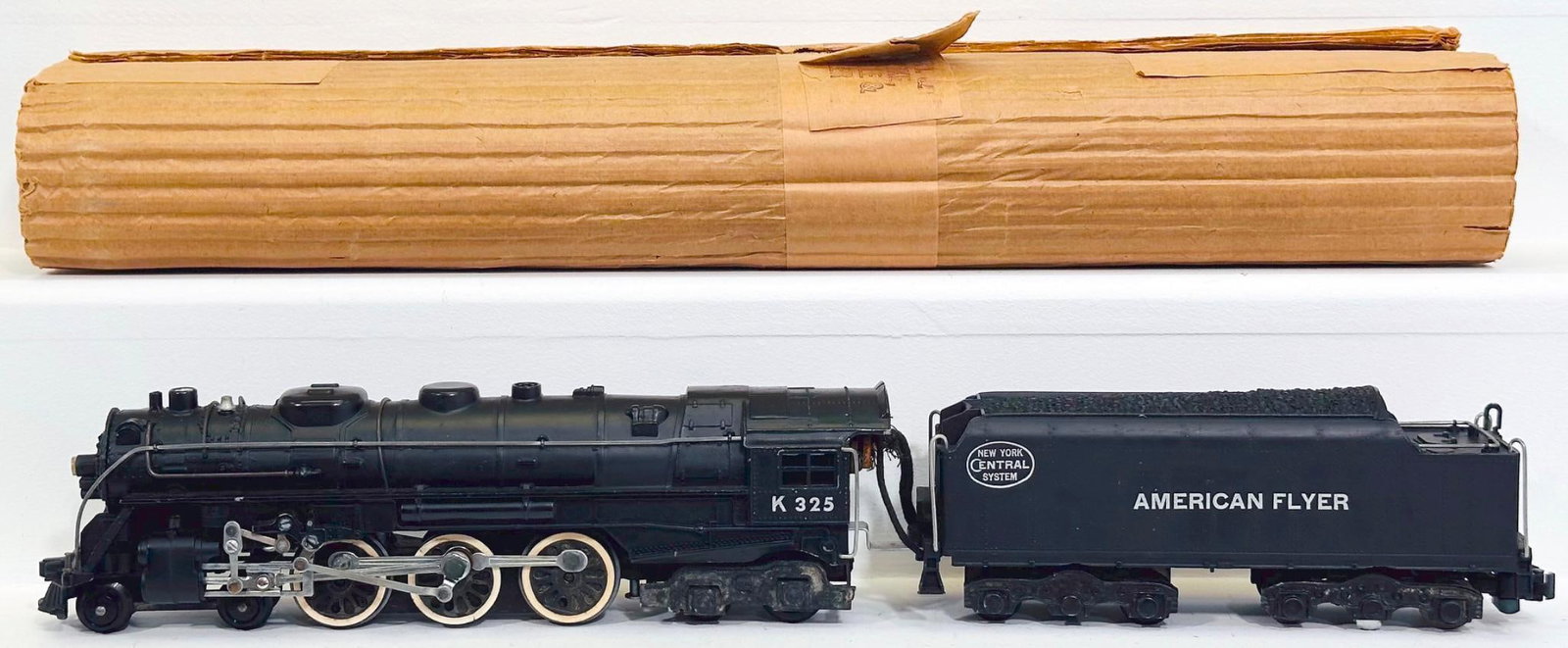 American Flyer Postwar S Gauge K325 New York Central 4 - 6 - 4 Locomotive and Tender: American Flyer Postwar S Gauge K325 New York Central 4 - 6 - 4 Locomotive and Tender, in C7 plus to C8 minus and with its original wrap.