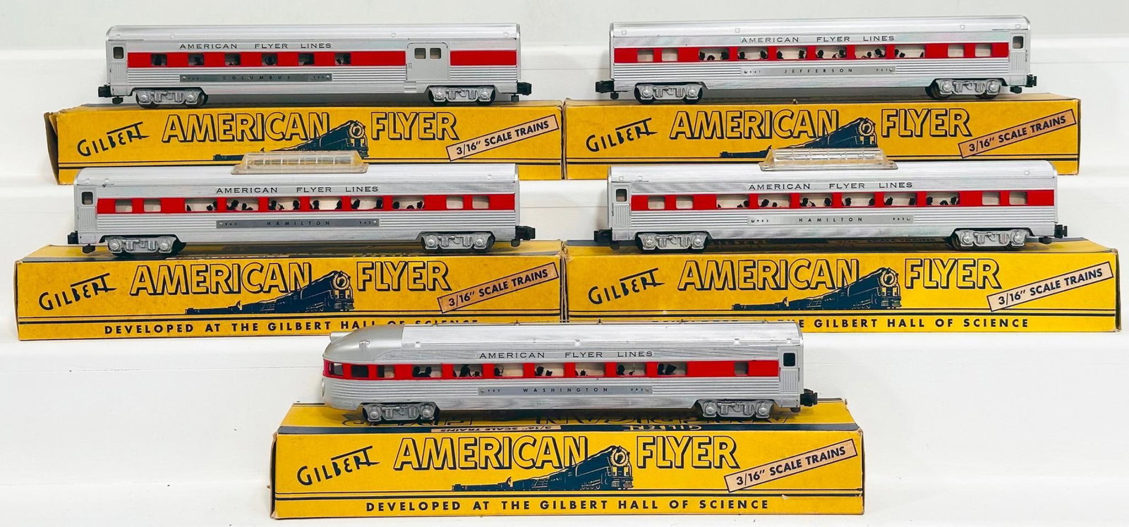 American Flyer Postwar S Gauge Five (5) Assorted Aluminum Passenger Cars with red stripes through: American Flyer Postwar S Gauge Five (5) Assorted Aluminum Passenger Cars with red stripes through the windows Boxed, including 960, 961, 962, 962 and 963, each in C7 to C7 plus and each with its origi