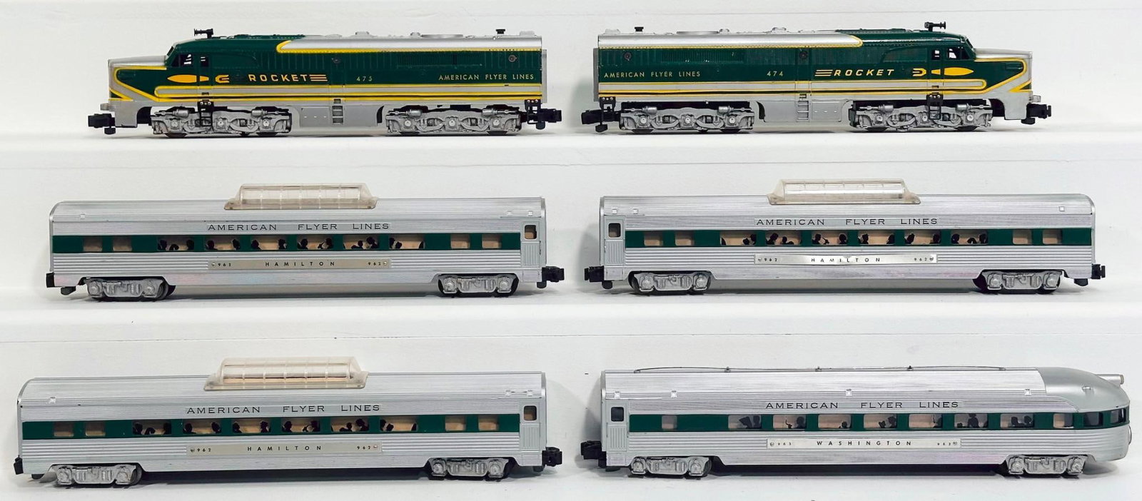 American Flyer Postwar S Gauge 473 and 474 Rocket A - A Alco Diesel Units/4 Assorted Aluminum: American Flyer Postwar S Gauge 473 and 474 Rocket A - A Alco Diesel Units and Four (4) Assorted Aluminum Passenger Cars with green stripes through the windows, with the 474 in C7, the 475 in C7 plus a