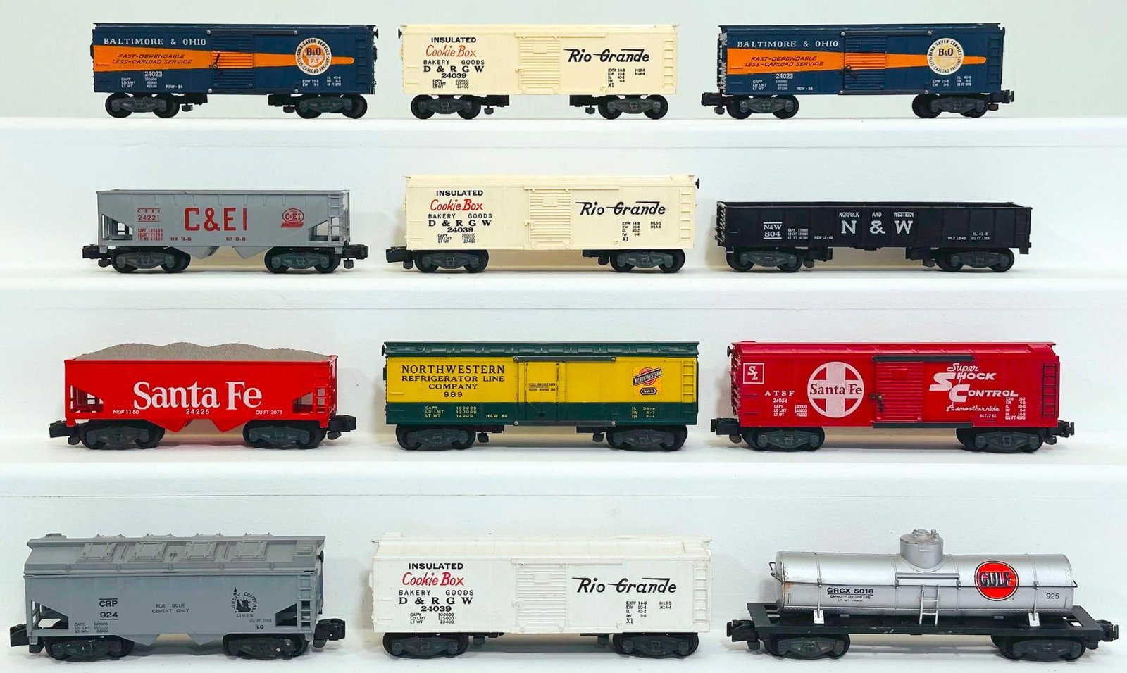 American Flyer Postwar S Gauge Twelve (12) Assorted Freight Cars: American Flyer Postwar S Gauge Twelve (12) Assorted Freight Cars, including 24054 in C7 plus, 989 in C7 plus, 925 in C7, 24039 in C7 plus, 24023 in C7, 24029 in C7, 24023 in C7 plus, 2409 in C7 plus, 