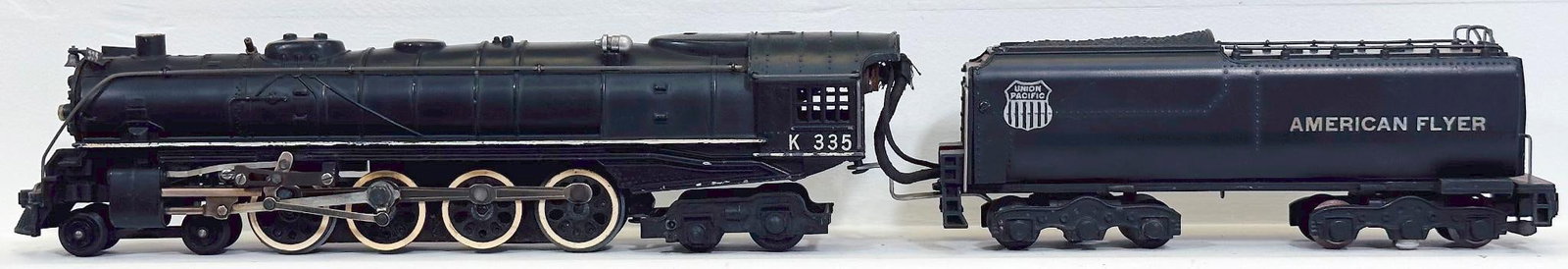 American Flyer Postwar S Gauge K335 Union Pacific Locomotive and Tender: American Flyer Postwar S Gauge K335 Union Pacific Locomotive and Tender, in C7 or better.