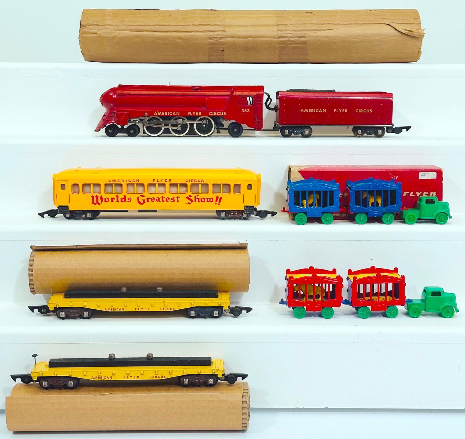 American Flyer Postwar S Gauge 353 Circus Locomotive and Tender with Two (2) Flat Cars with loads: American Flyer Postwar S Gauge 353 Circus Locomotive and Tender with Two (2) Flat Cars with loads and Passenger Cars, each in C7 plus or better and with original wrap for the 353.