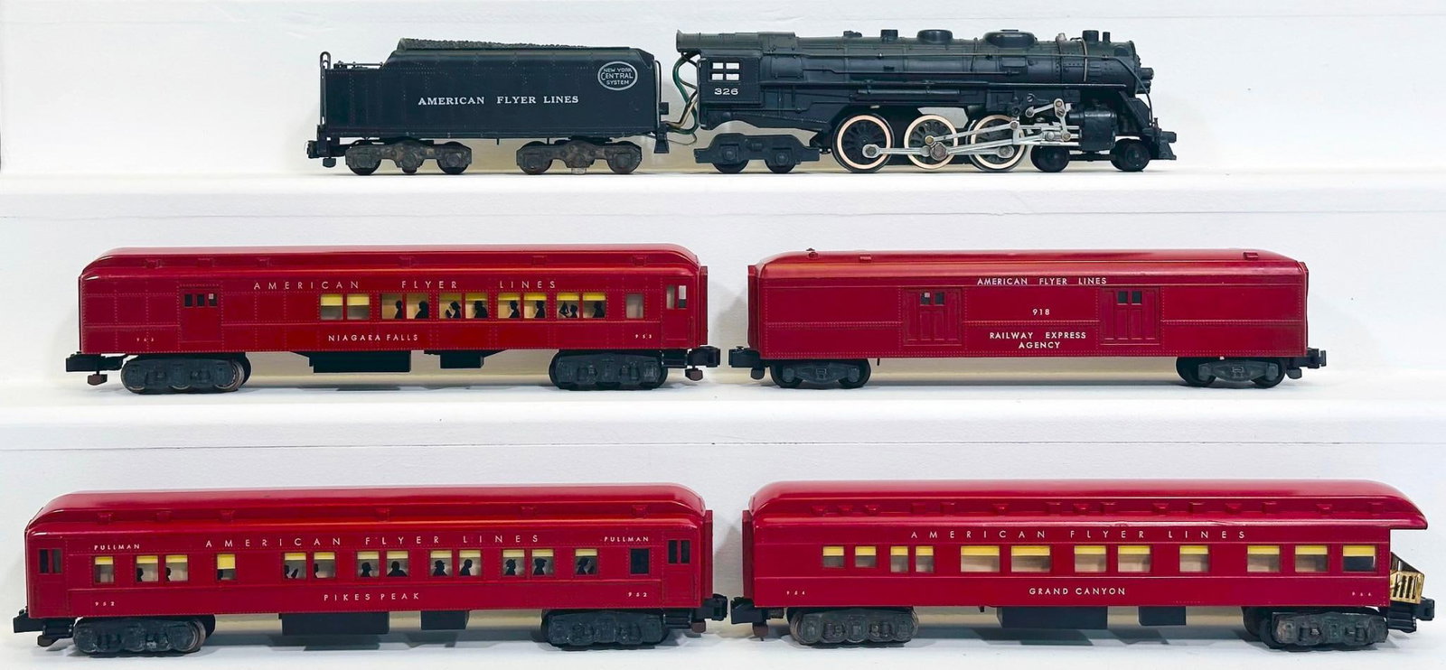 American Flyer Postwar S Gauge 326 New York Central 4 - 6 - 4 Locomotive and Tender and Four (4): American Flyer Postwar S Gauge 326 New York Central 4 - 6 - 4 Locomotive and Tender and Four (4) dark red Passenger Cars, with the 326 in C7 plus. This Lot also includes 963, 962, 964 and 918 dark red